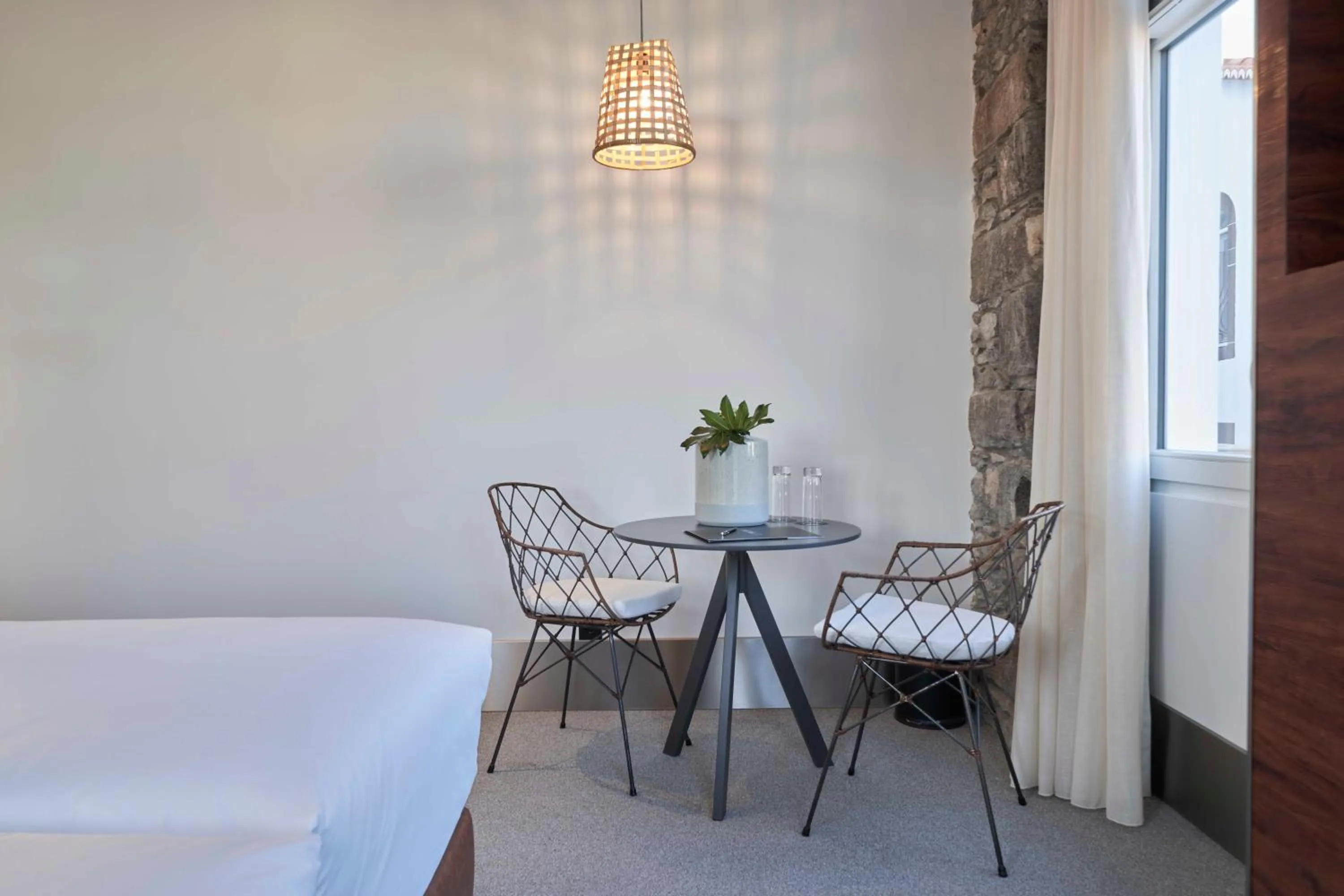 Seating area, Bed in Hotel Cajú