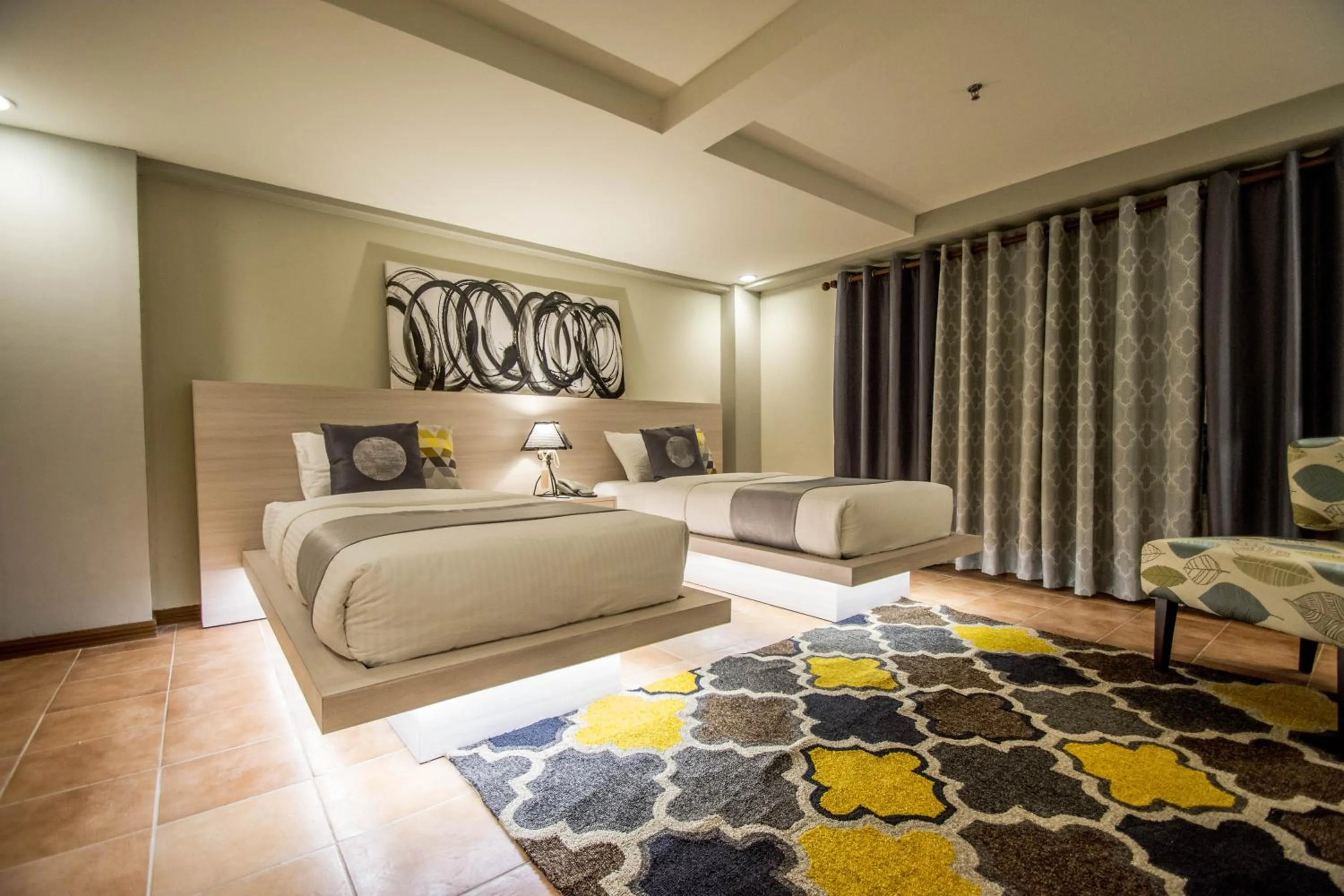 Decorative detail, Bed in Almont City Hotel