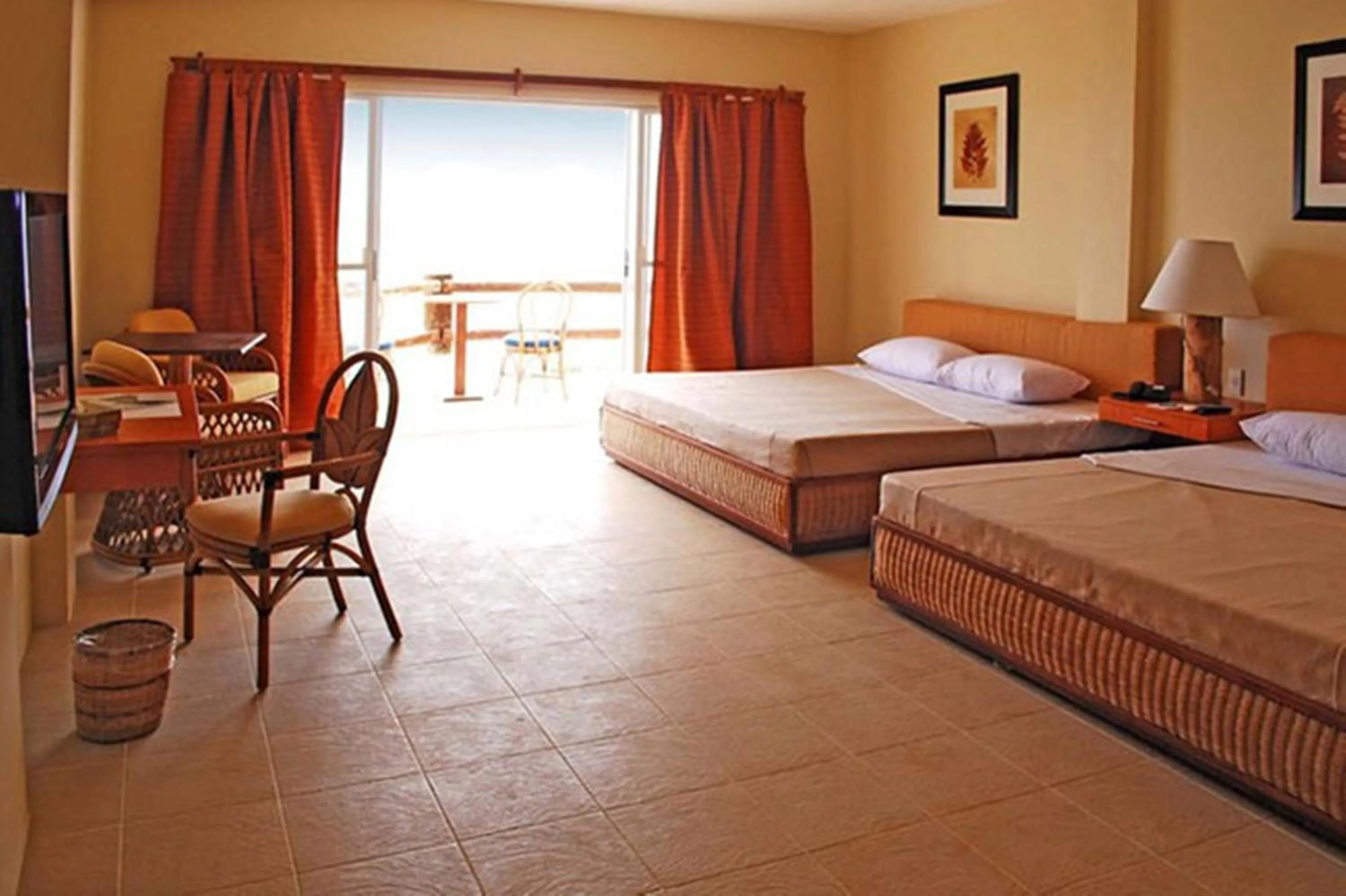 Bed in Almont Beach Resort