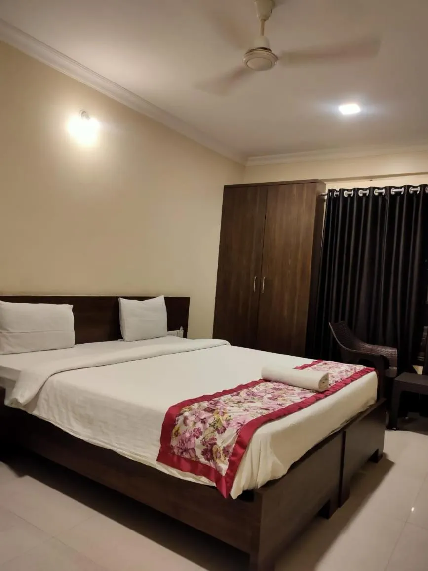 Bed in Kedari Residency