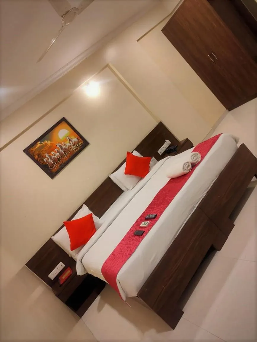 Bed in Kedari Residency