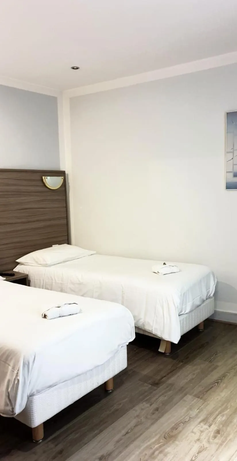 Bed in Hotel PARIS GAMBETTA- PANAMHOTEL-PERE LACHAISE