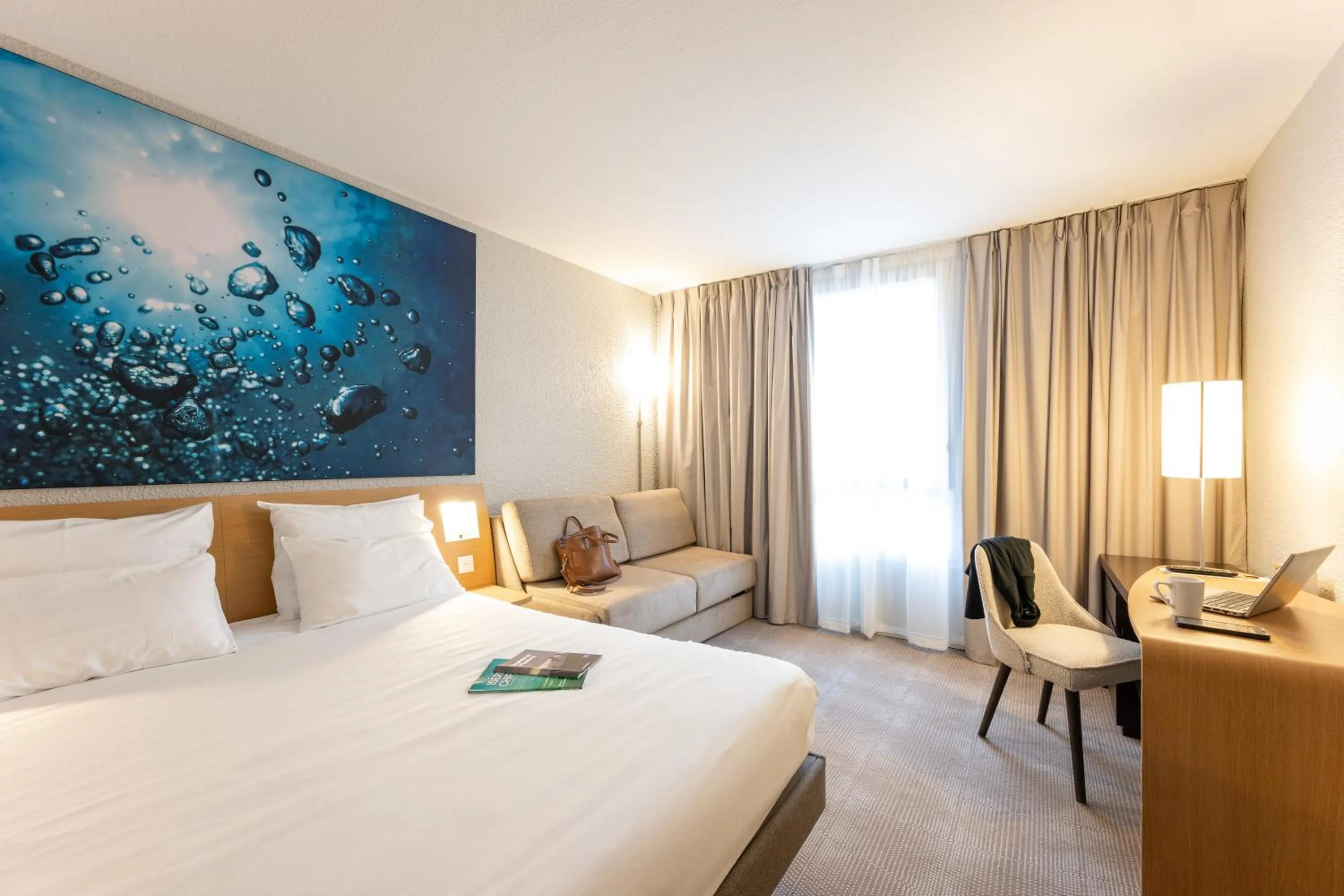 View (from property/room), Bed in Novotel Grenoble Nord Voreppe