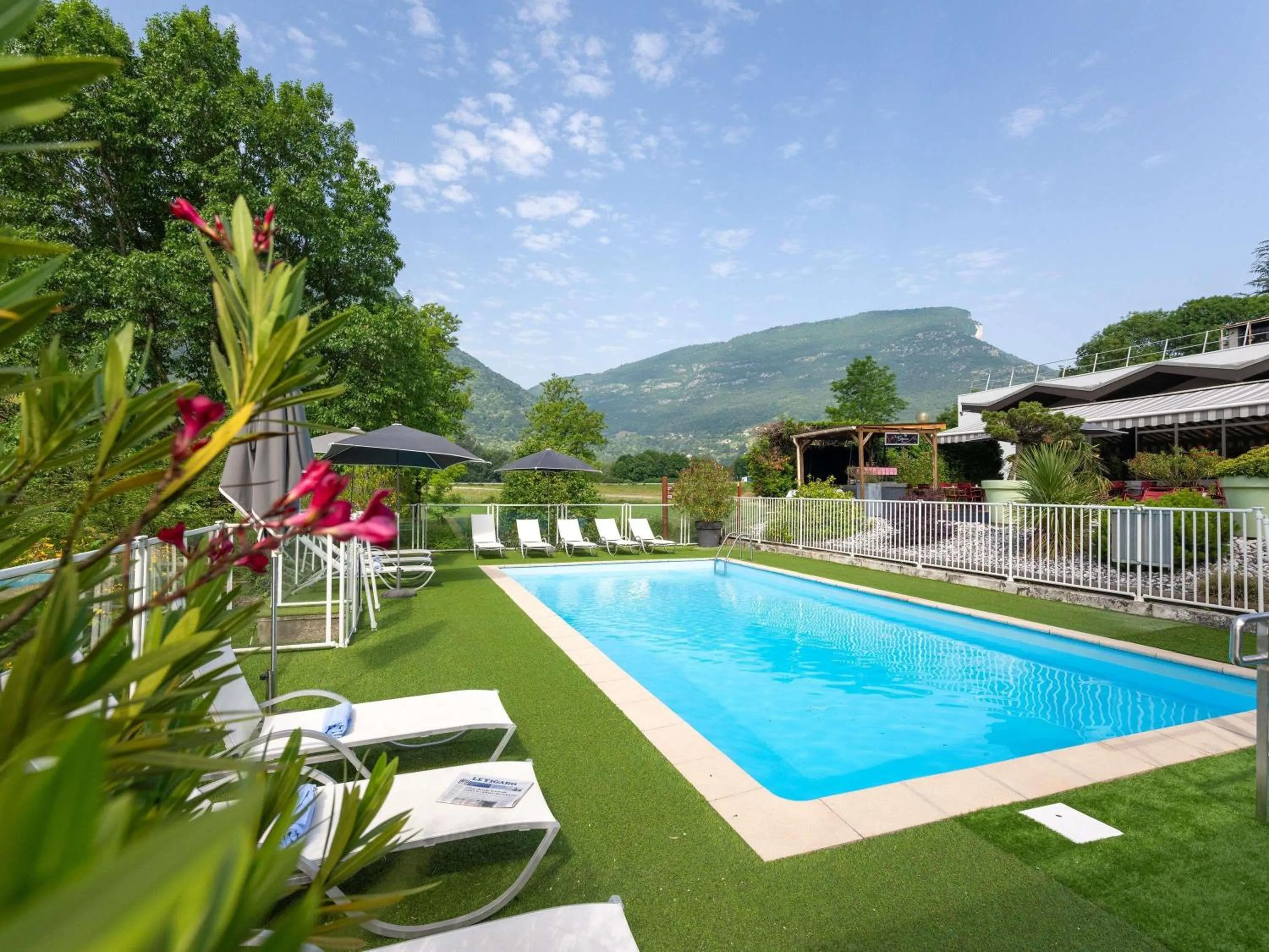 Pool view in Novotel Grenoble Nord Voreppe