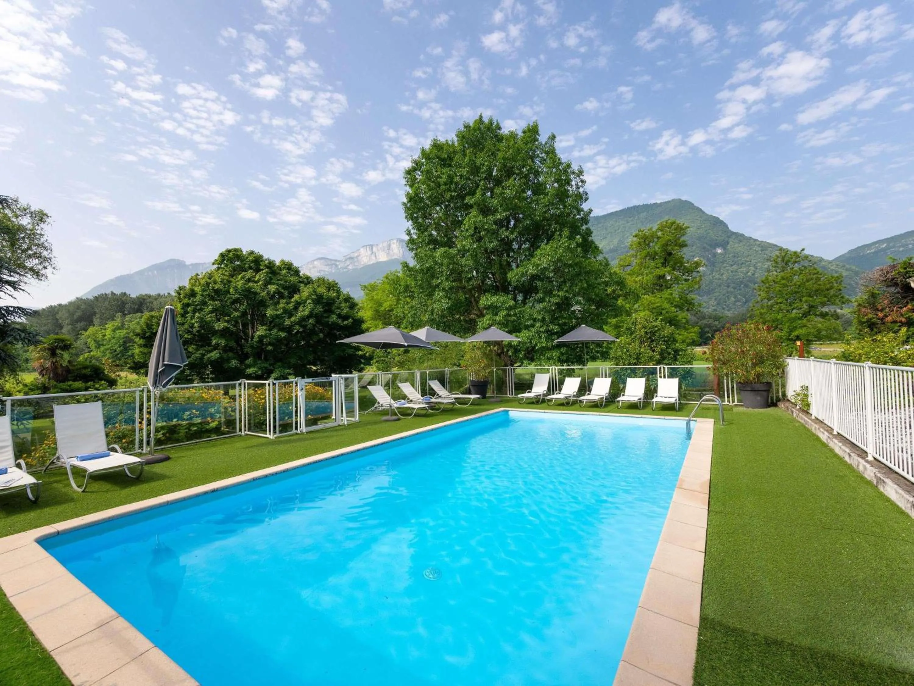 Pool view in Novotel Grenoble Nord Voreppe