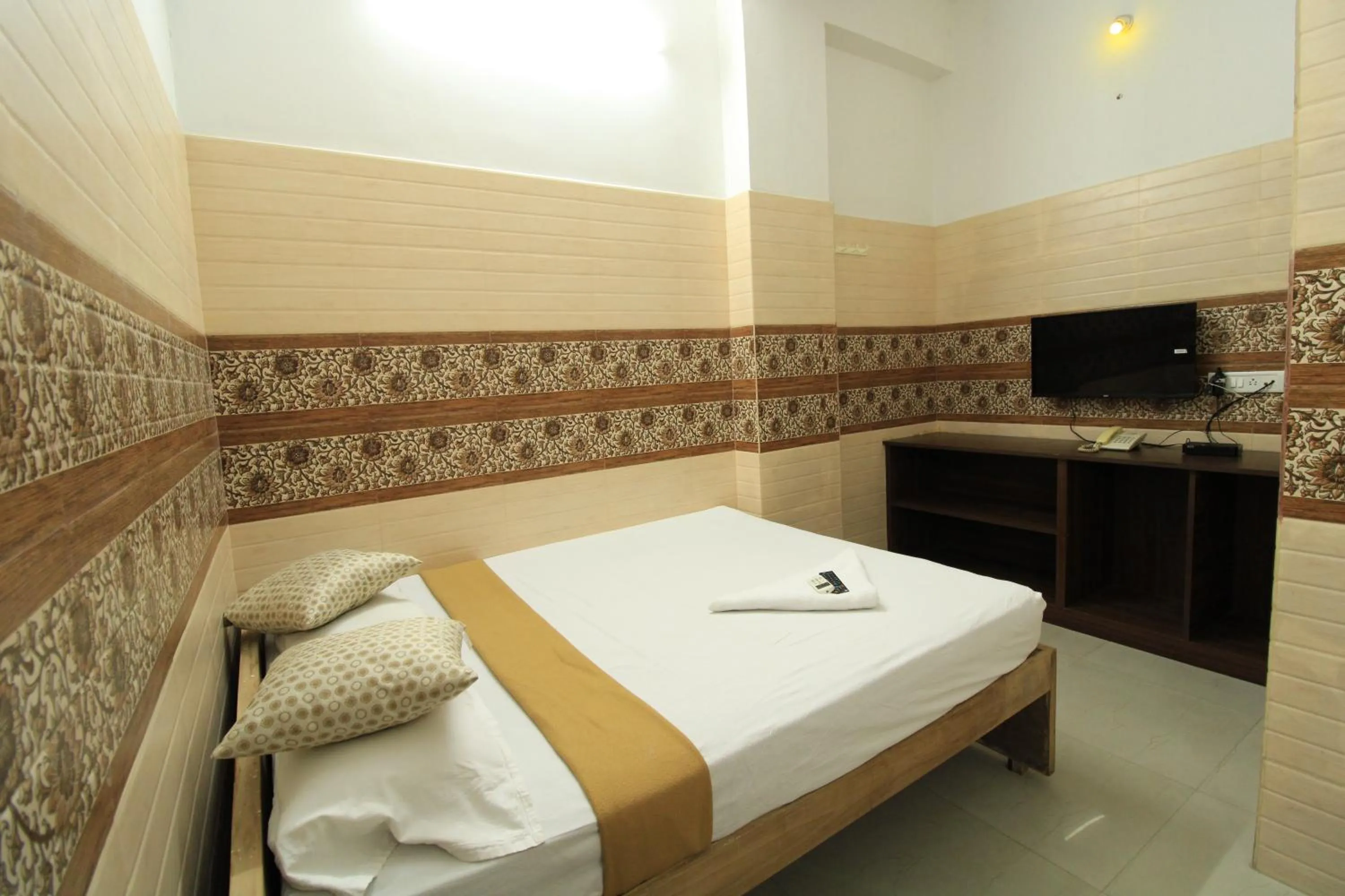 Bed in Just Guest House, Chennai Airport