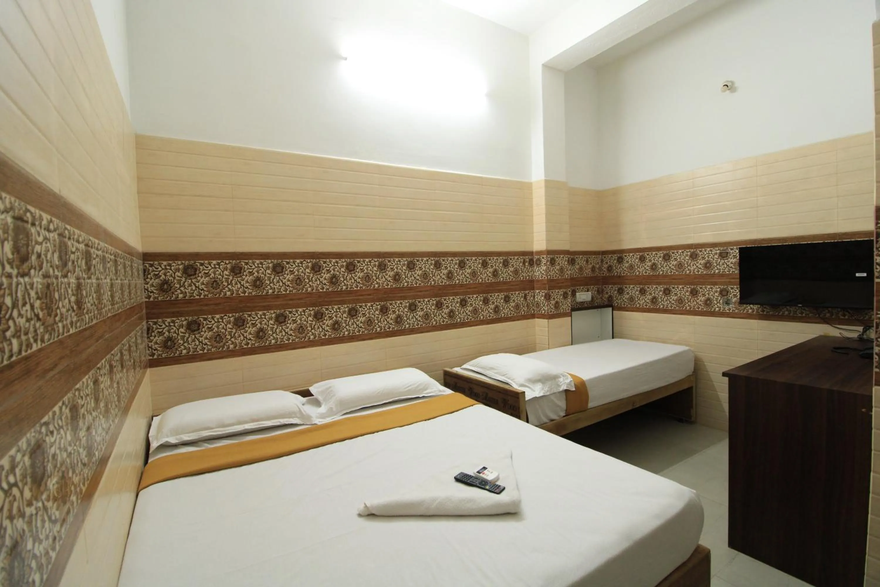 Bed in Just Guest House, Chennai Airport