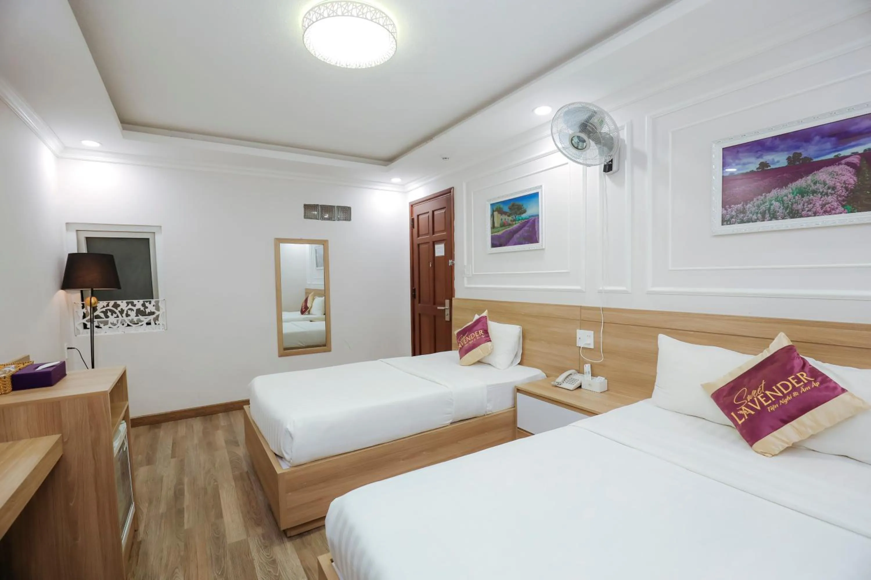 Bed in Sweet Lavender Hotel