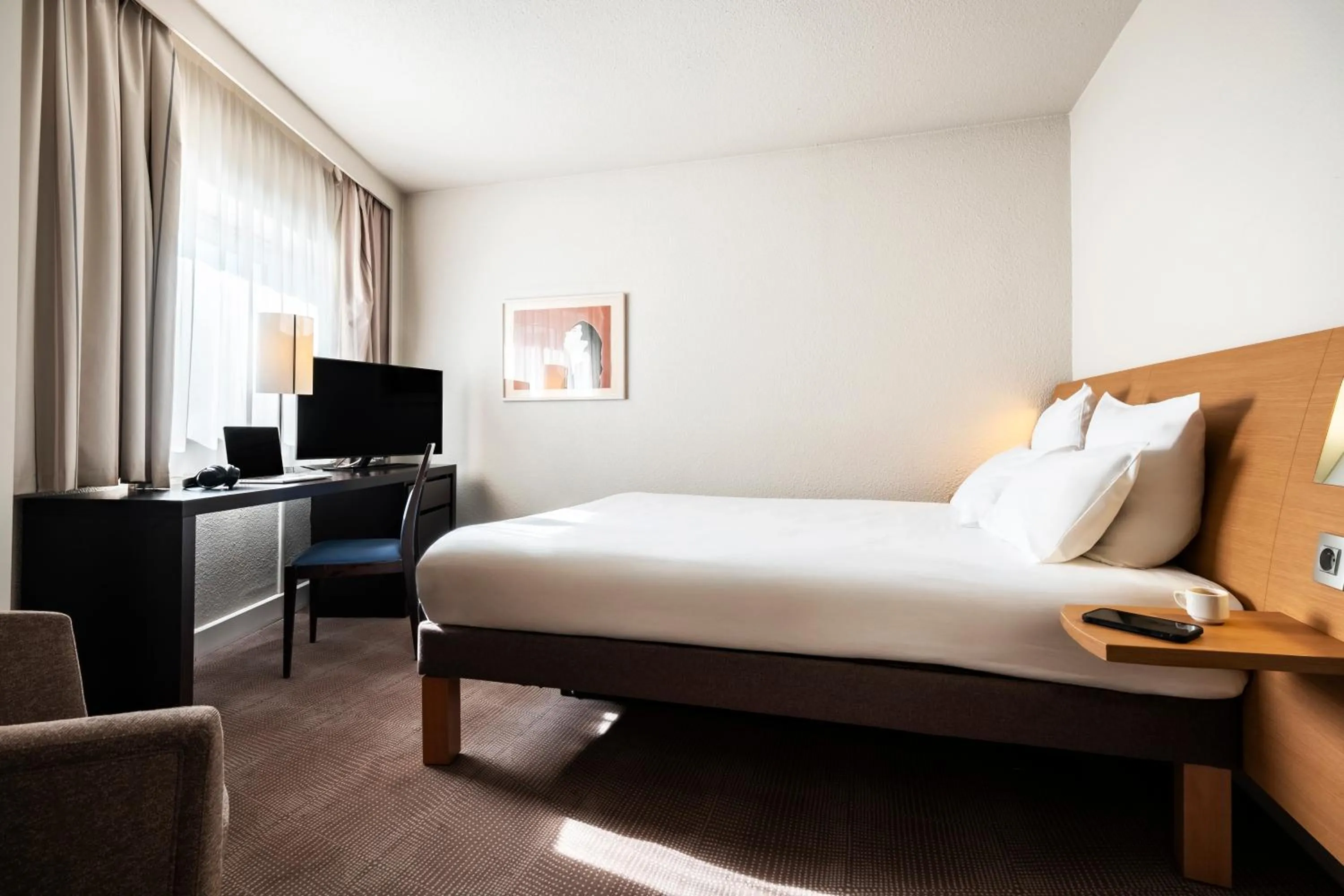 Bed in Novotel Belfort Centre Atria