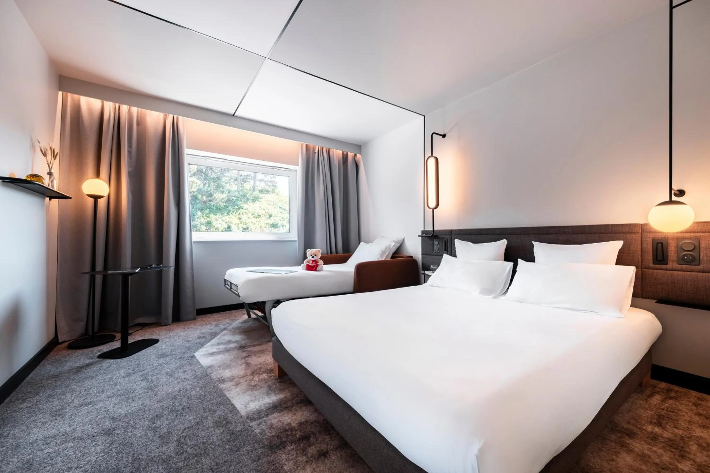 Bed in Novotel Belfort Centre Atria