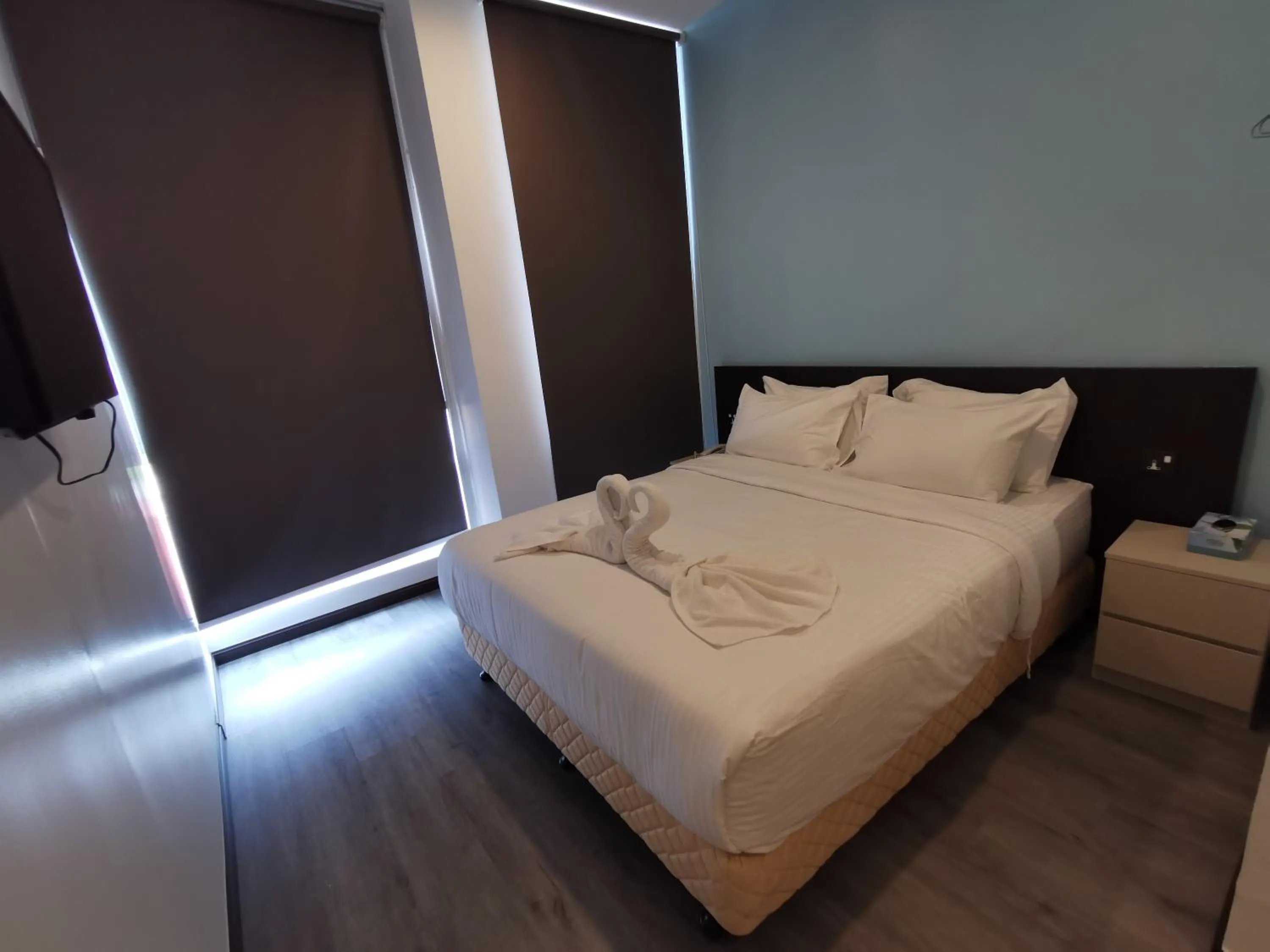 Photo of the whole room, Bed in TT Dorf Hotel Taiping