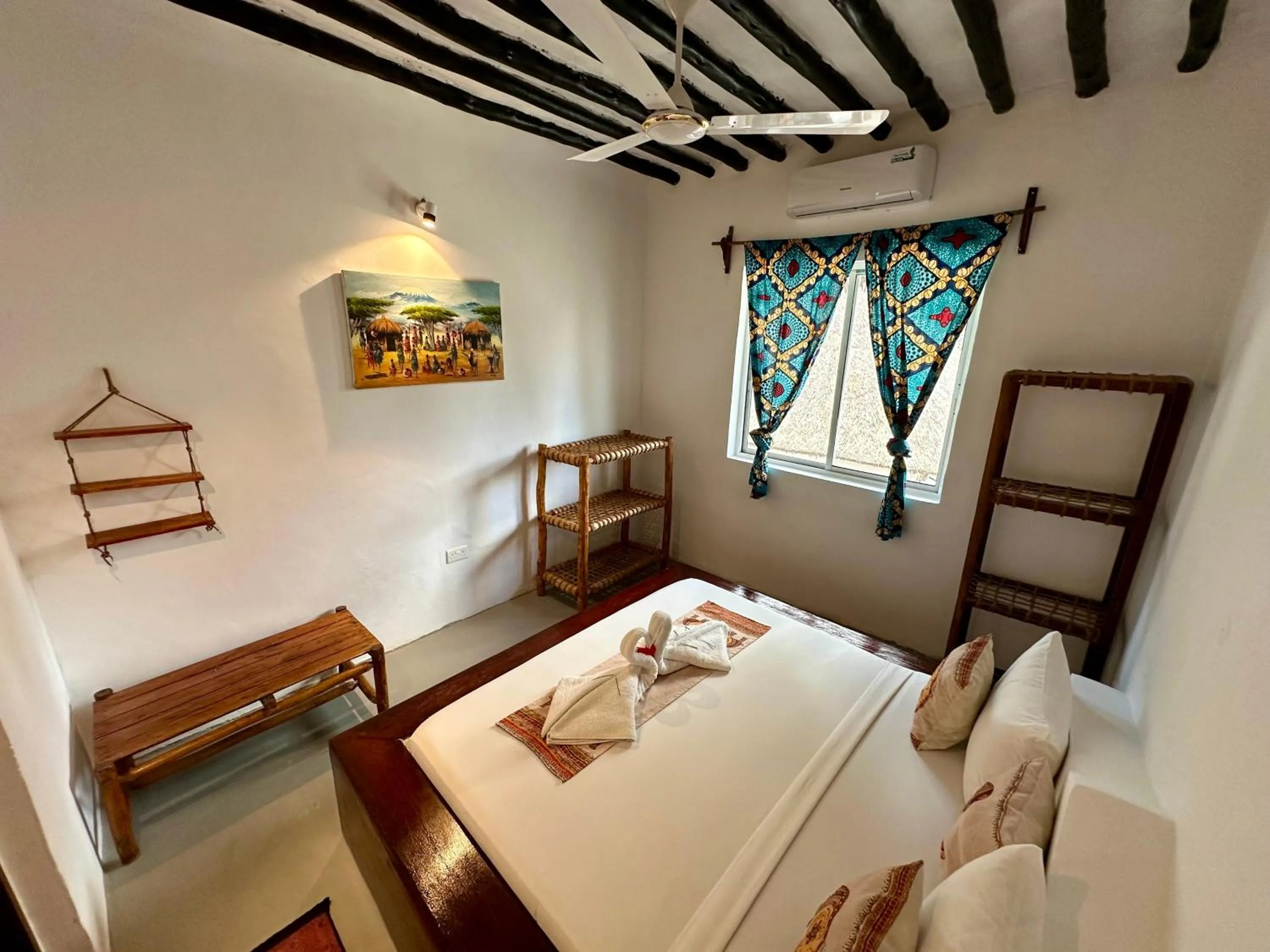 Bed in The African Paradise Beach Hotel