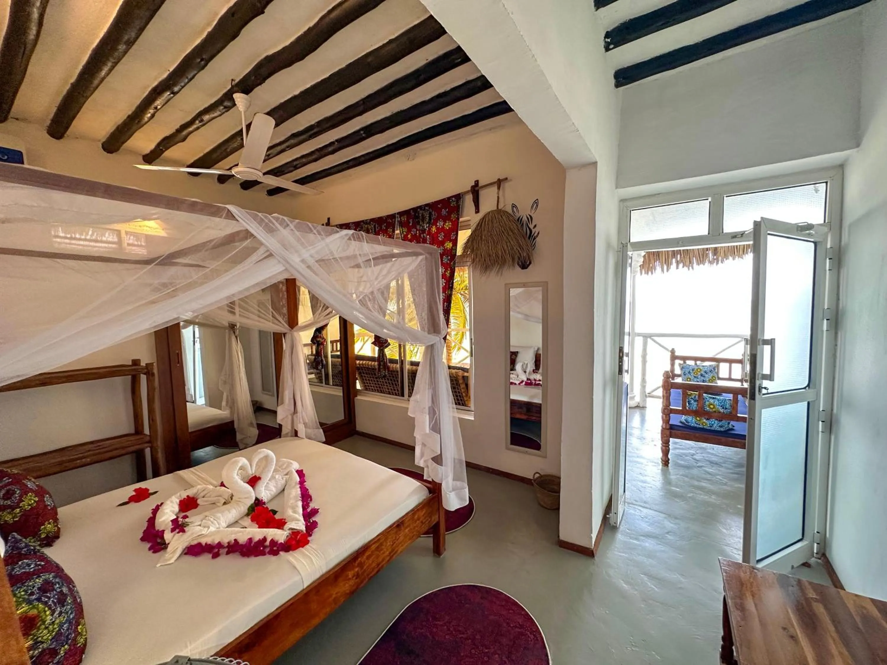 Bed in The African Paradise Beach Hotel