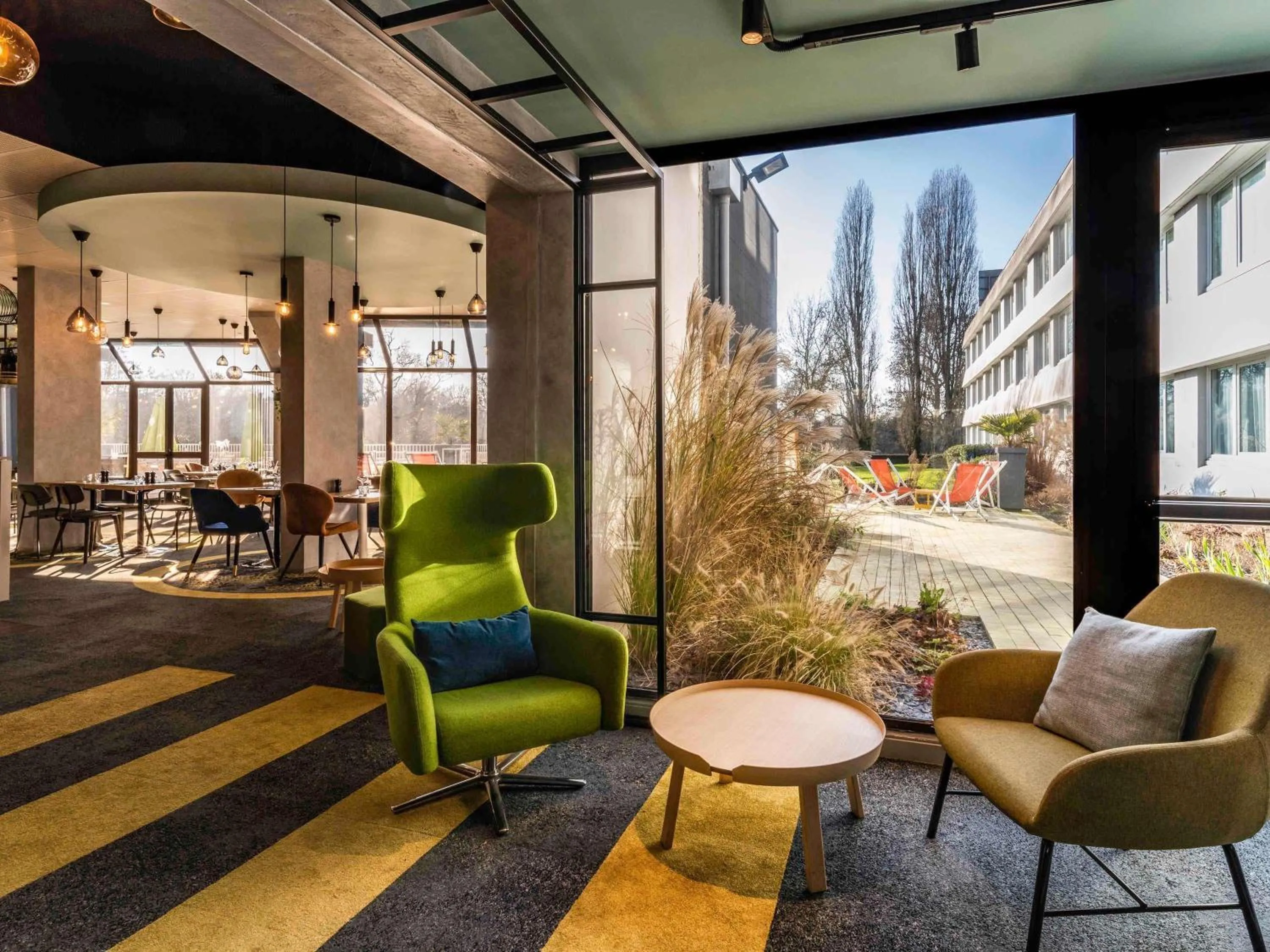 Lounge or bar in Novotel Le Mans