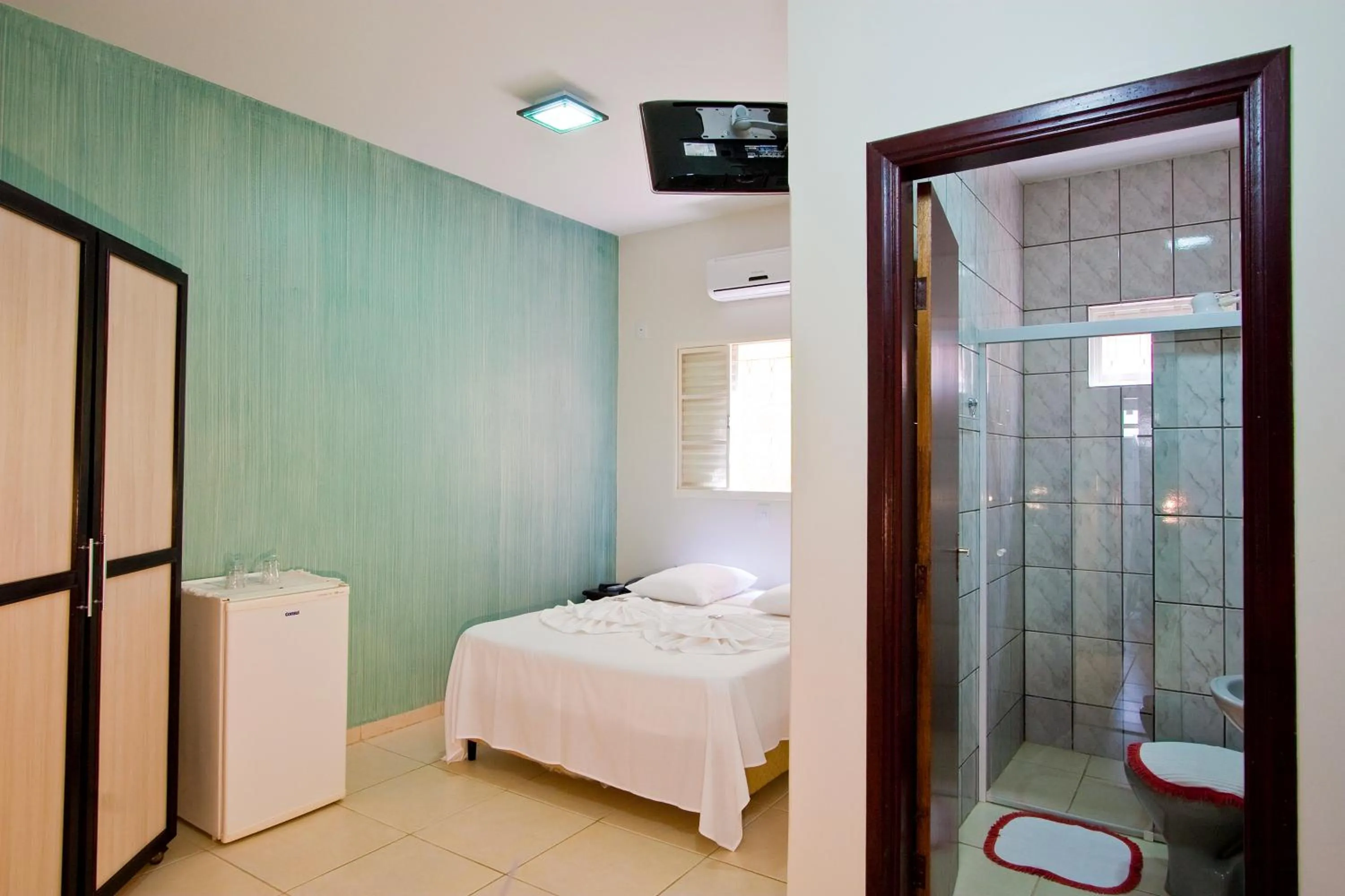 Photo of the whole room, Bed in Hotel Pousada Calliandra