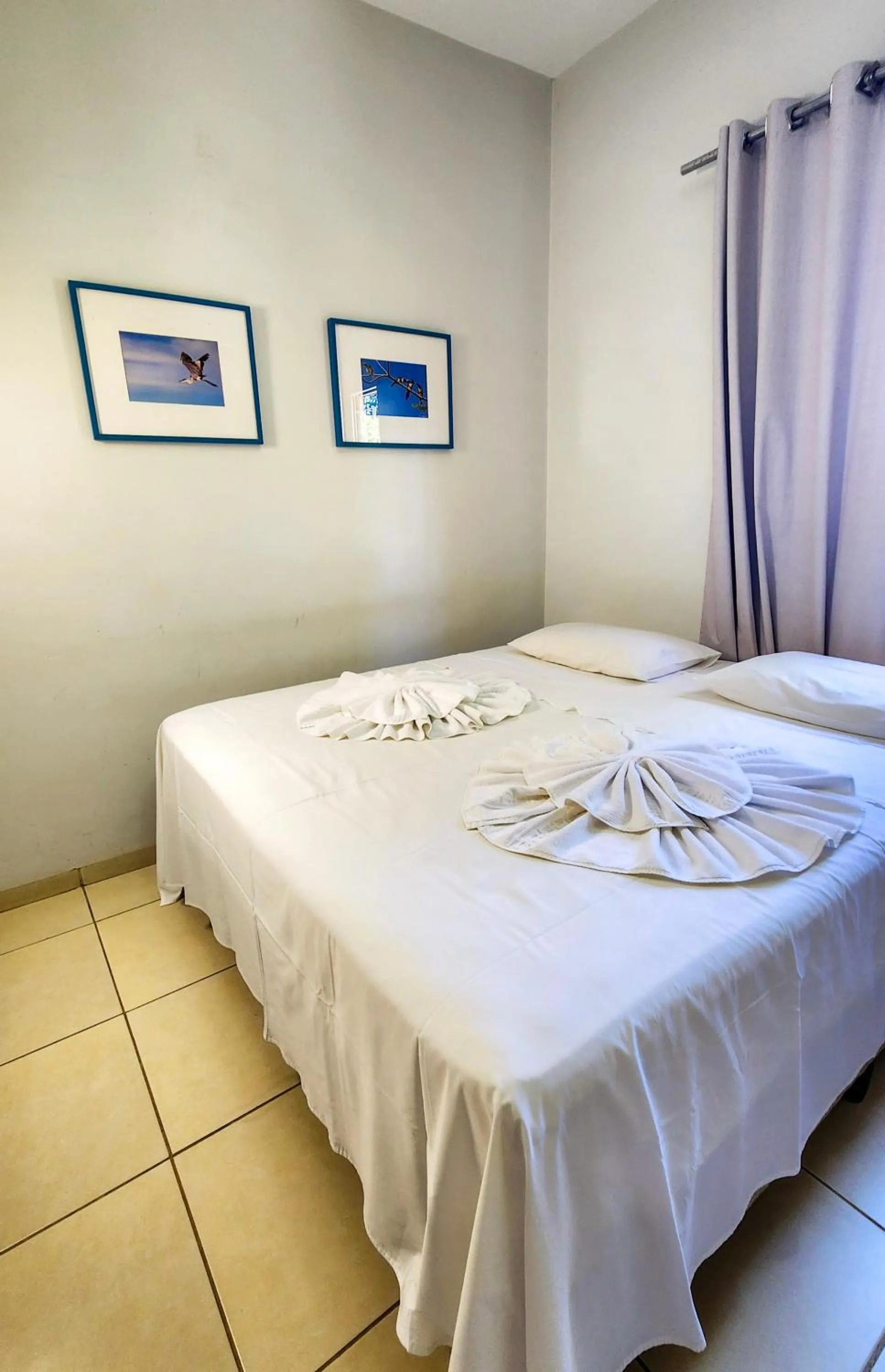 Bed in Hotel Pousada Calliandra