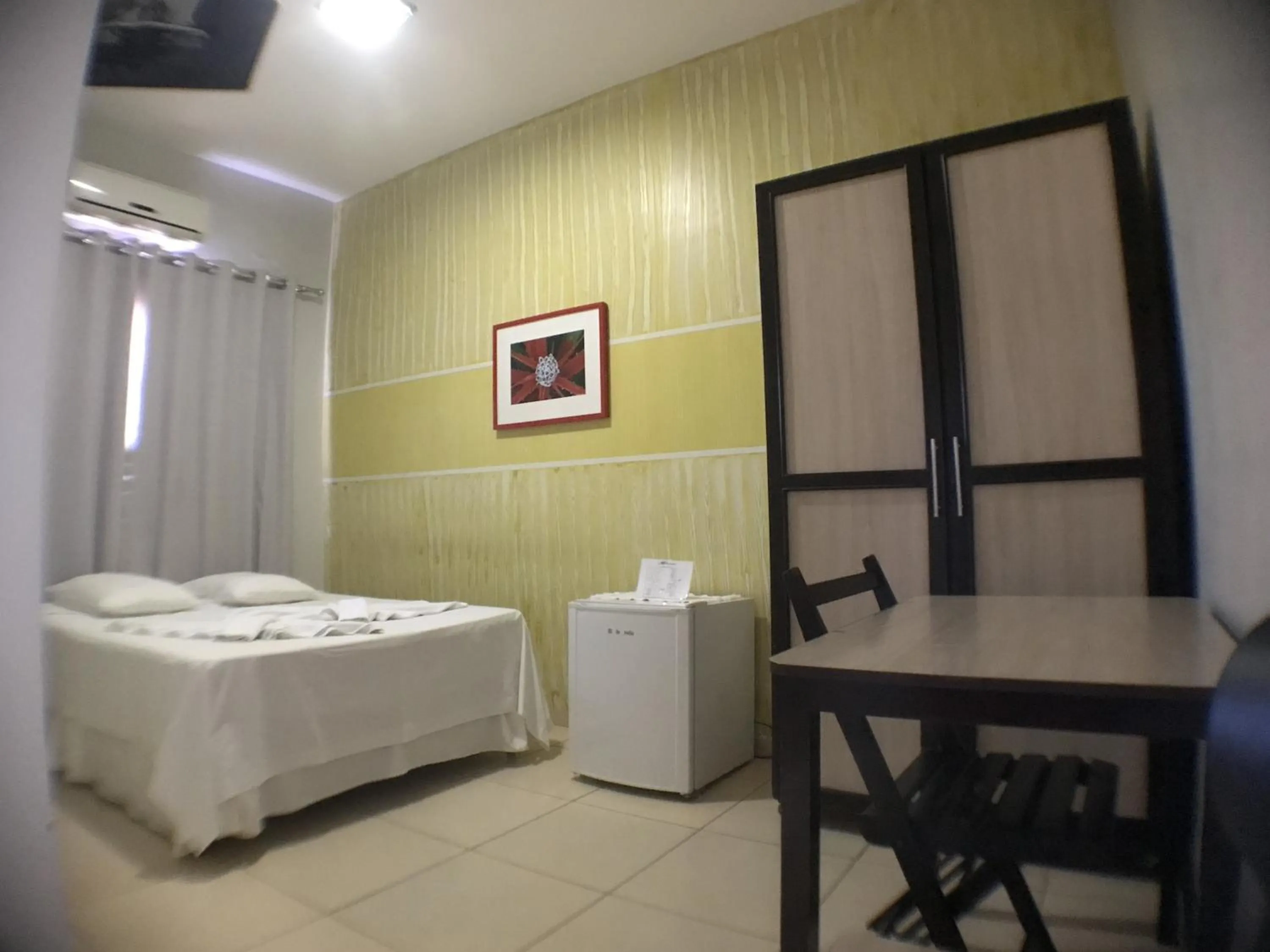 Photo of the whole room, Bed in Hotel Pousada Calliandra