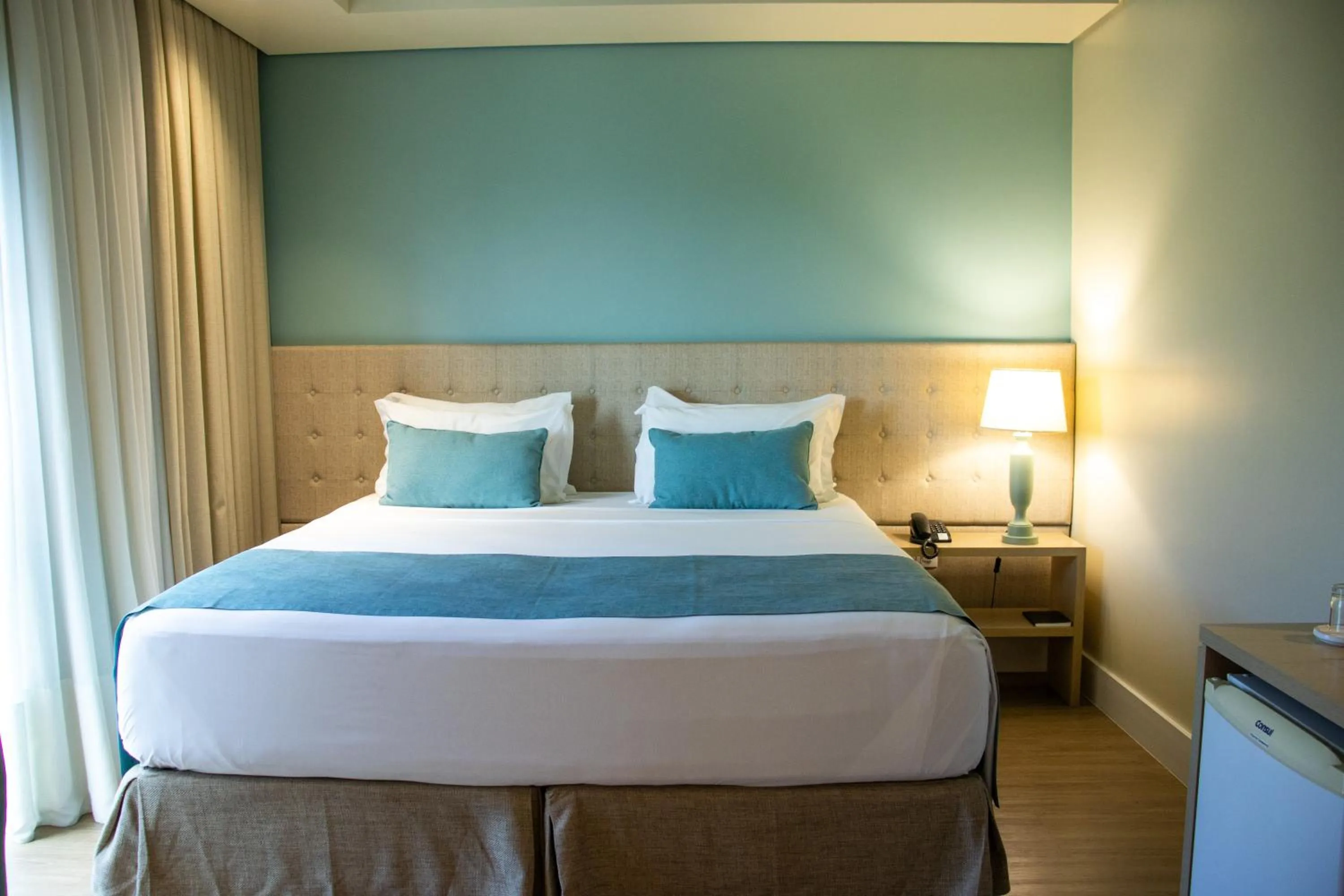 Bed in Kayrós Business Hotel