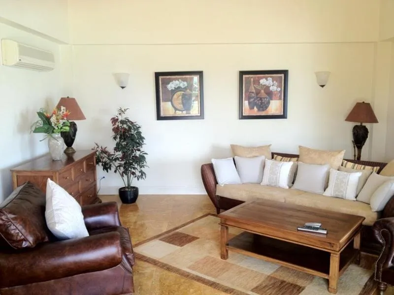 Living room in White Sands Beach Condos