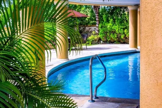 Swimming pool in White Sands Beach Condos