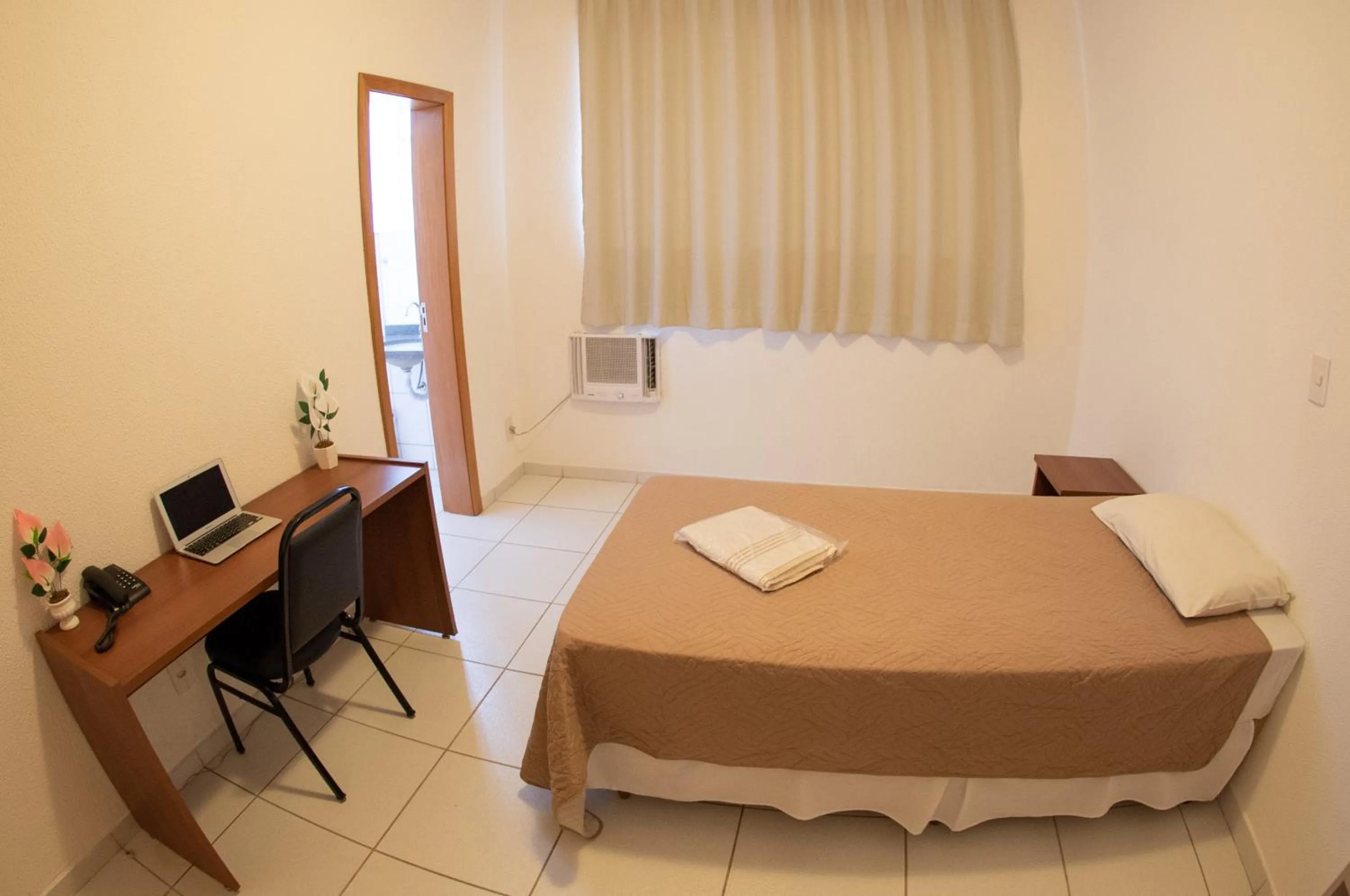 Bed in Getúllio Hotel