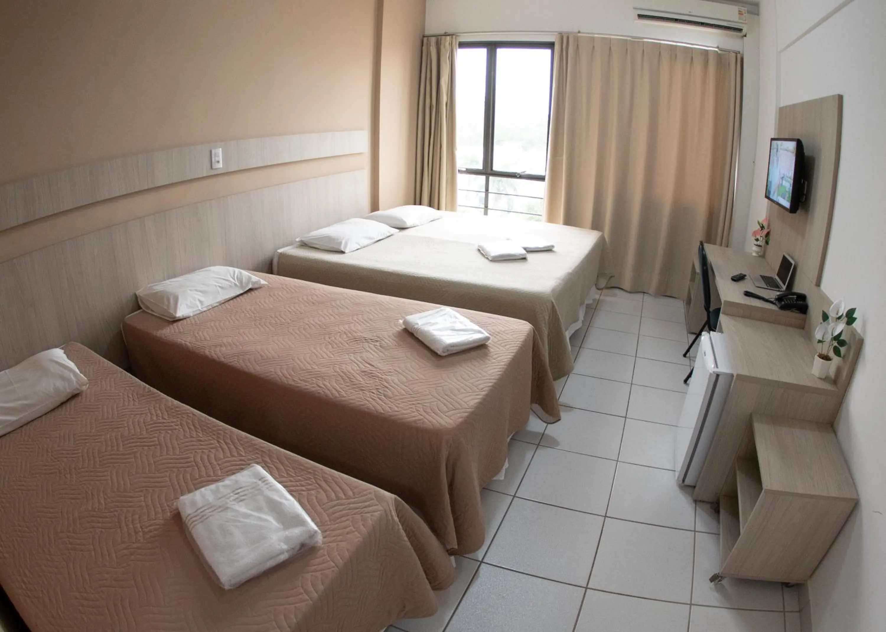 Bed in Getúllio Hotel