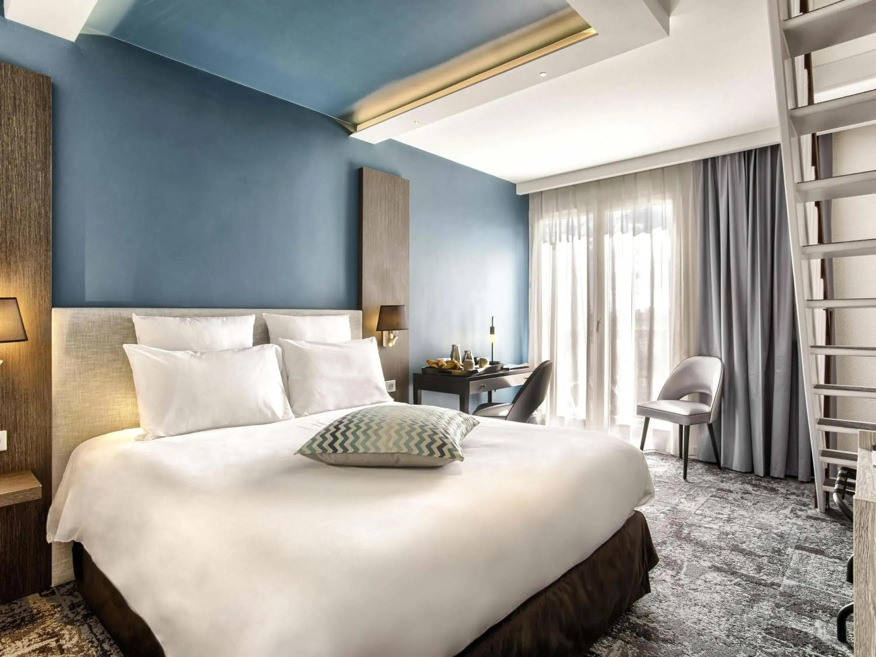 Superior Duplex Apartment with One Double Bed and Two Single Beds in Mercure Cabourg Hôtel & Spa Superior Duplex Apartment with One Double Bed and Two Single Beds in Mercure Cabourg Hôtel & Spa