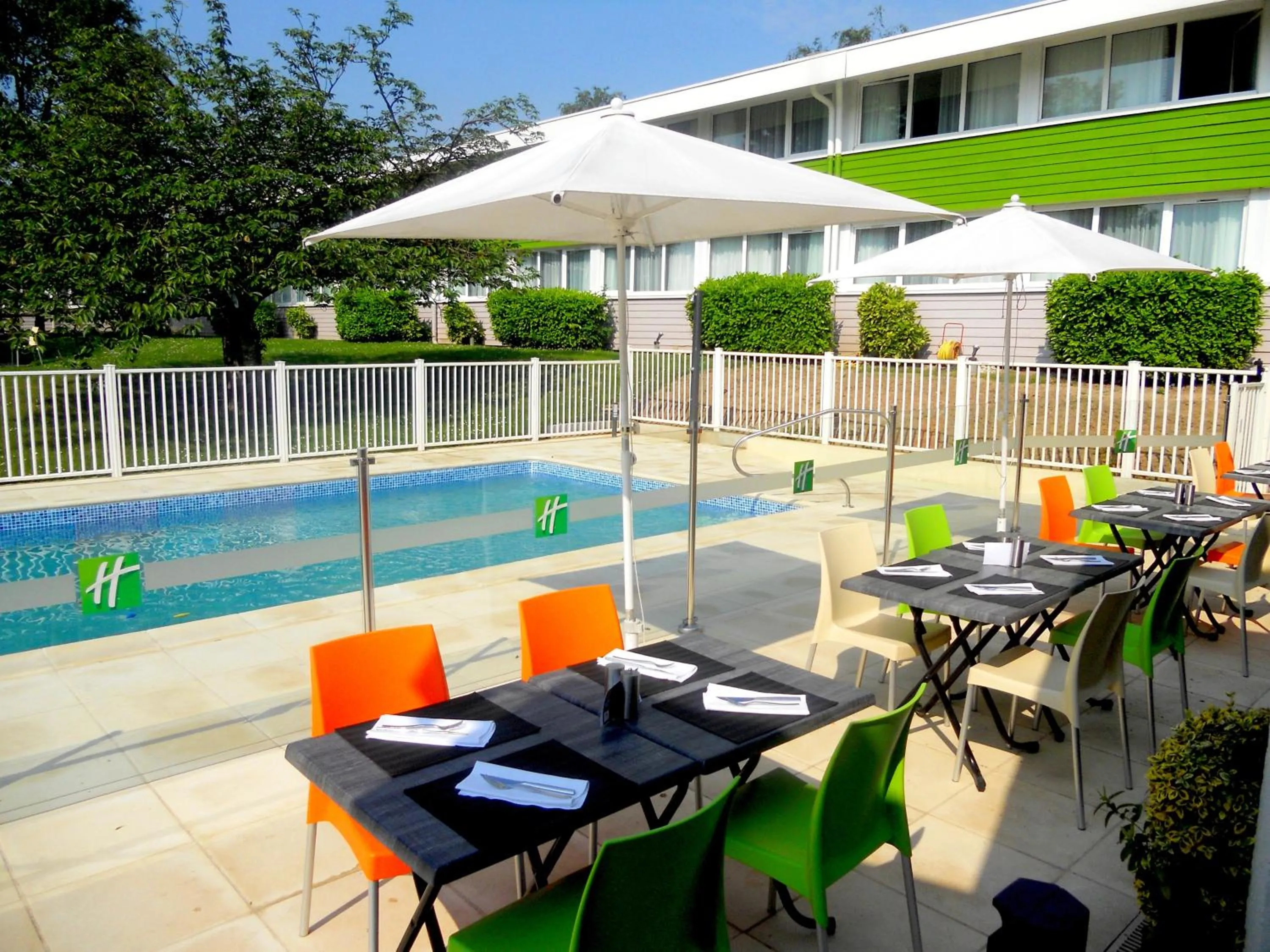Swimming pool in Holiday Inn Lille Ouest Englos by IHG