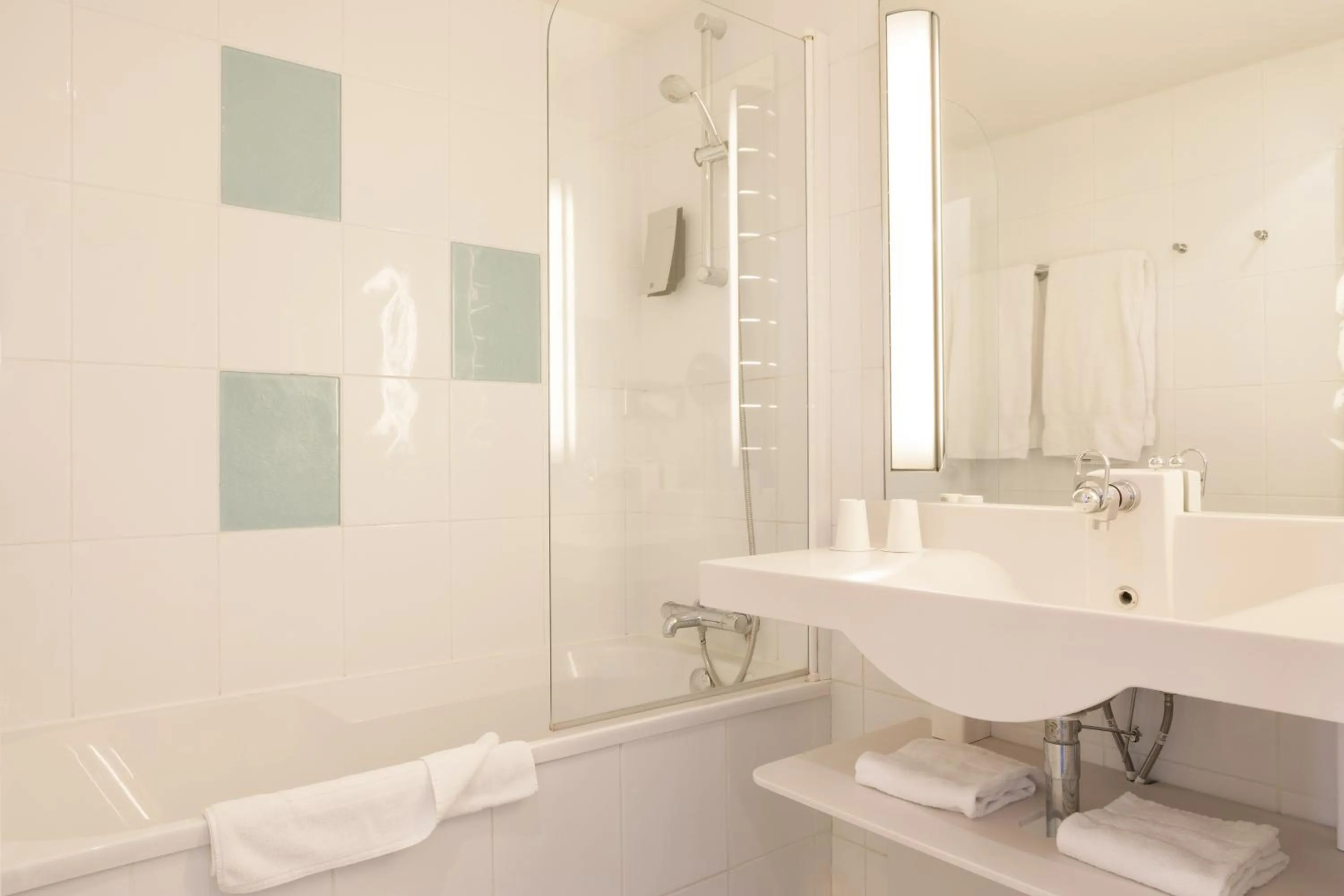 Bathroom in Holiday Inn Lille Ouest Englos by IHG