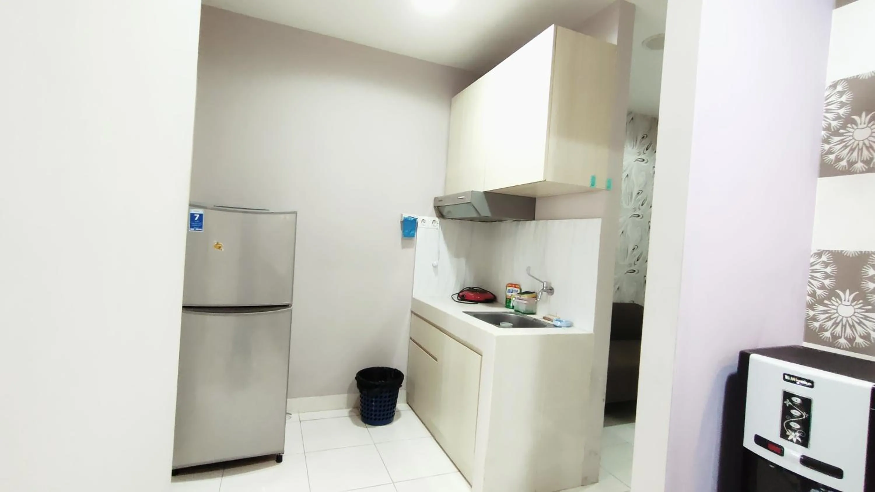Kitchen or kitchenette in Kozy Room Sentul Tower Apartemen