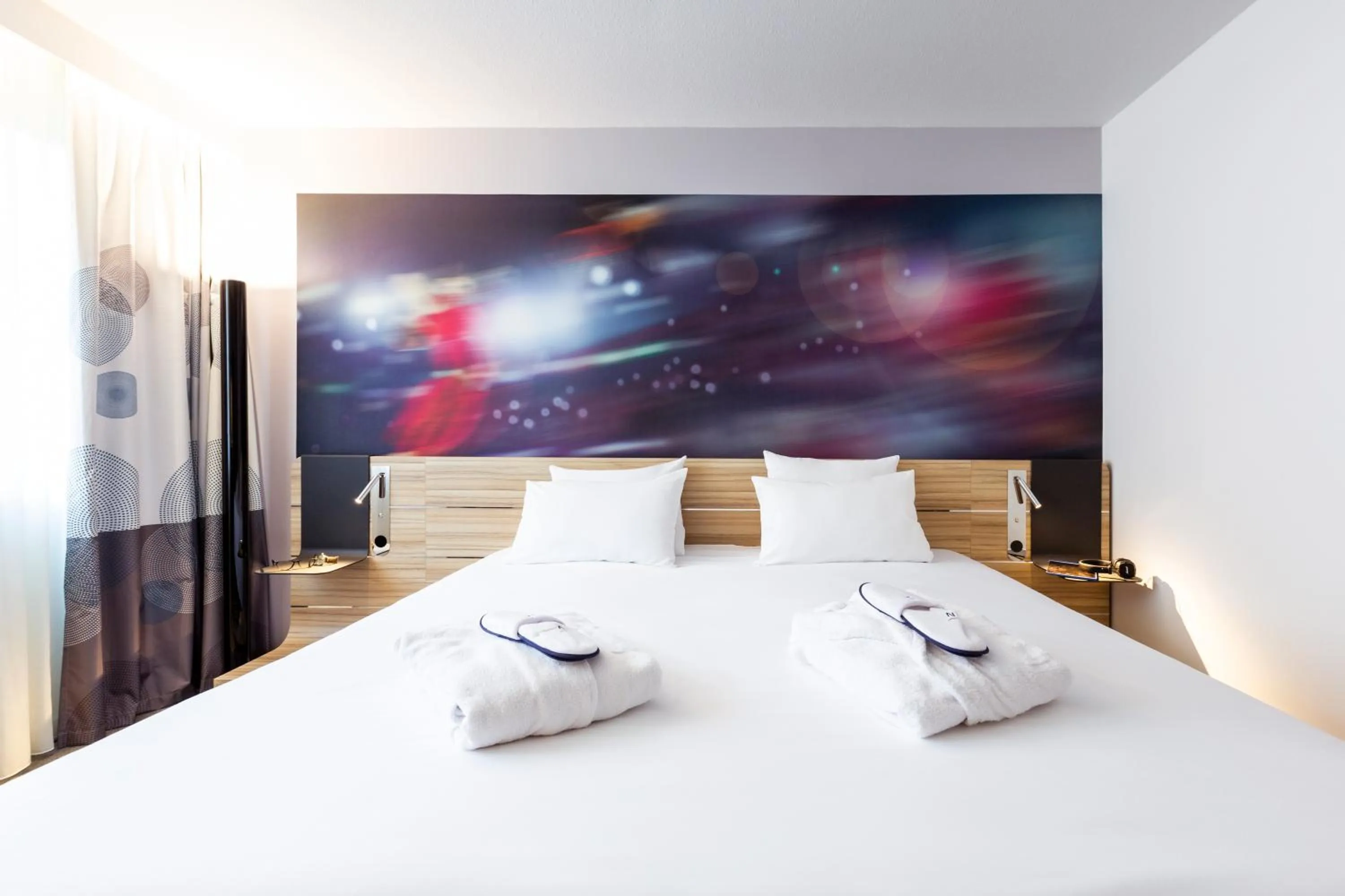 Bed in Novotel Limoges Le Lac