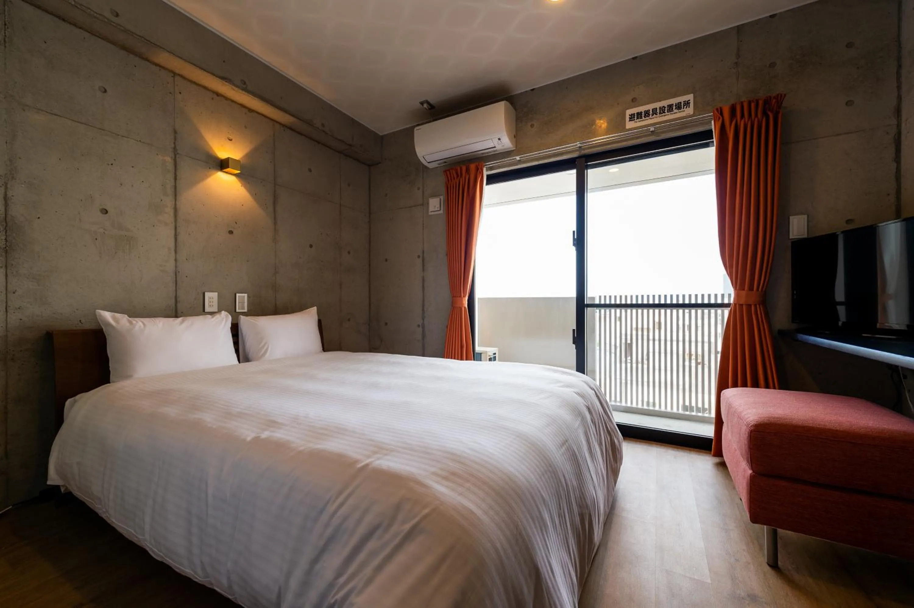 Bed in Hotel Little Island Okinawa Matsuyama