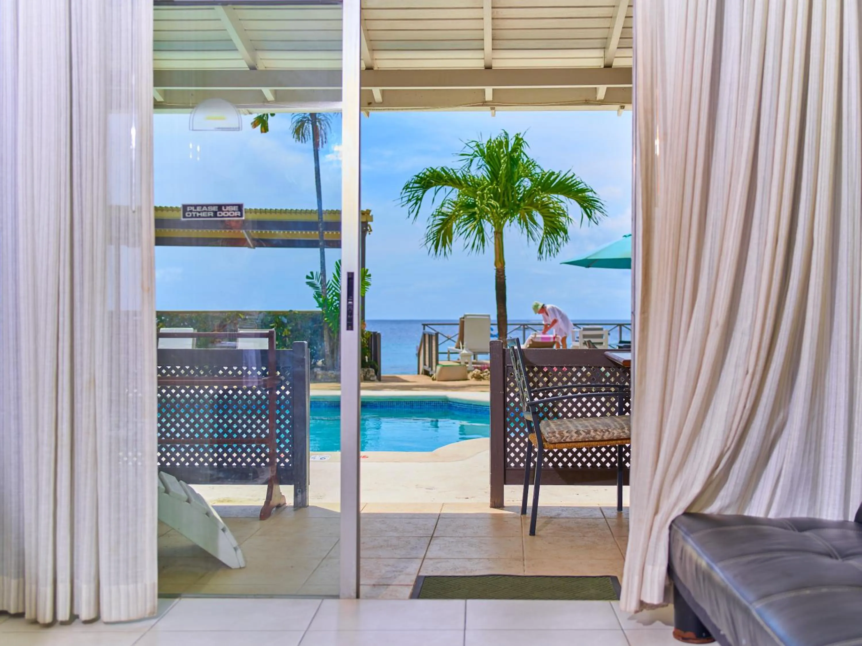 Pool view in Tropical Sunset Beach Apartment Hotel