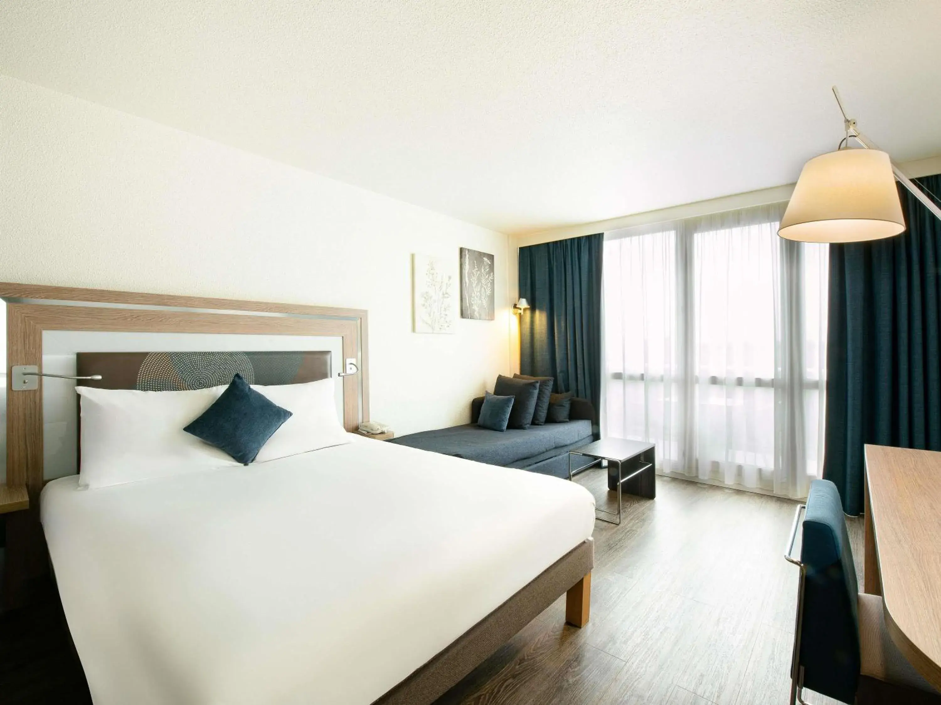 Superior Double Room with Sofa Bed and Golf Course View in Novotel Senart Golf De Greenparc Superior Double Room with Sofa Bed and Golf Course View in Novotel Senart Golf De Greenparc