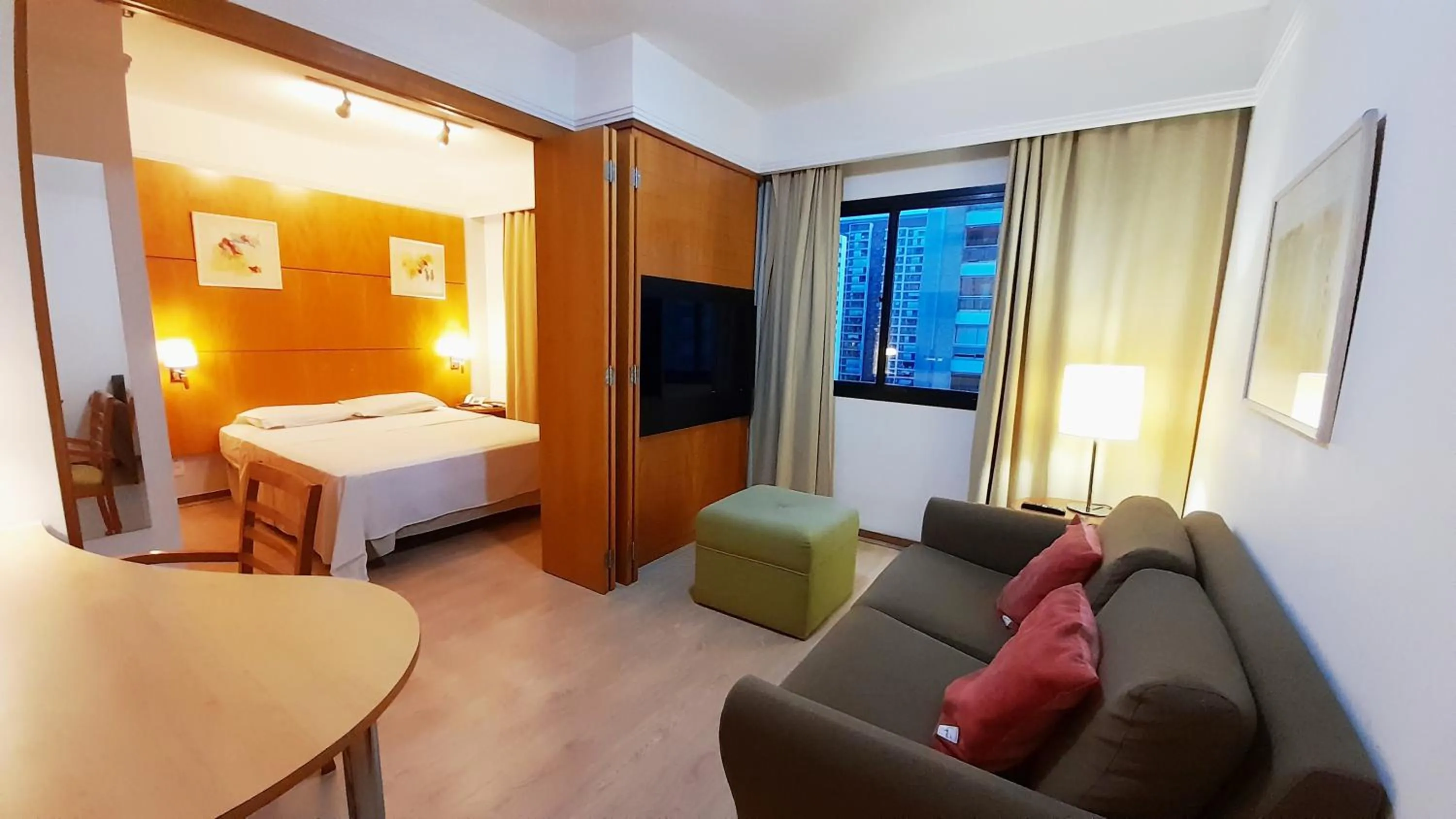 Living room, Bed in lMPECAVEL Flat - Moema proximo Shopping Ibirapuera