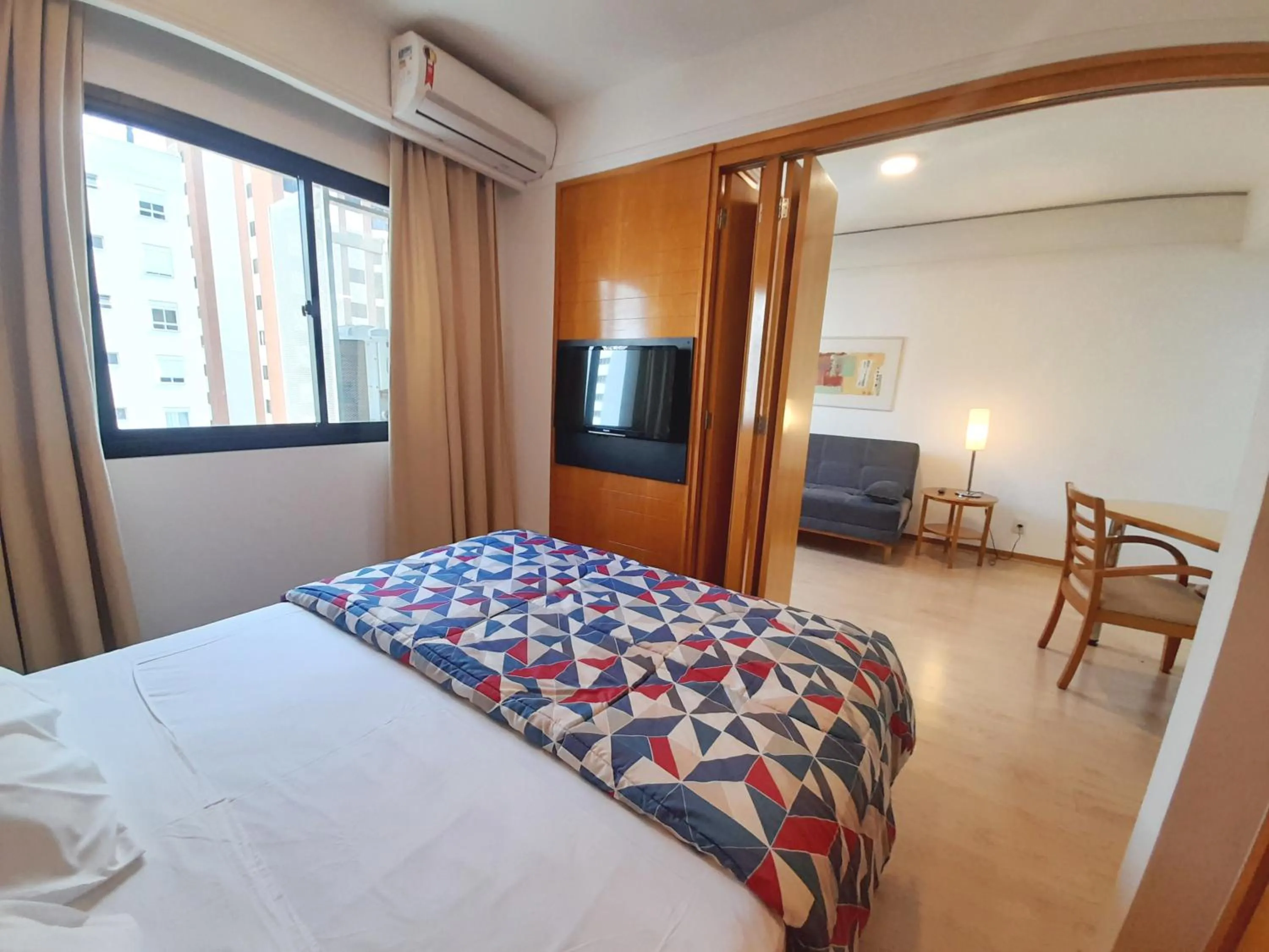 Living room, Bed in lMPECAVEL Flat - Moema proximo Shopping Ibirapuera