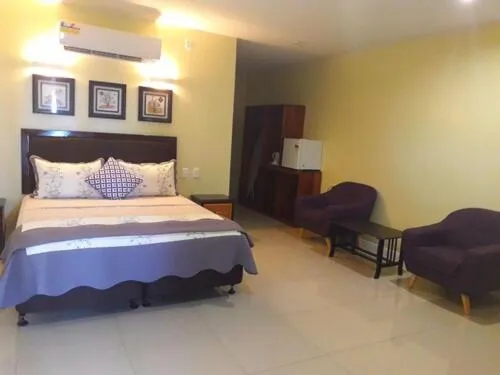 Bed in Le Uaina Beach Resort