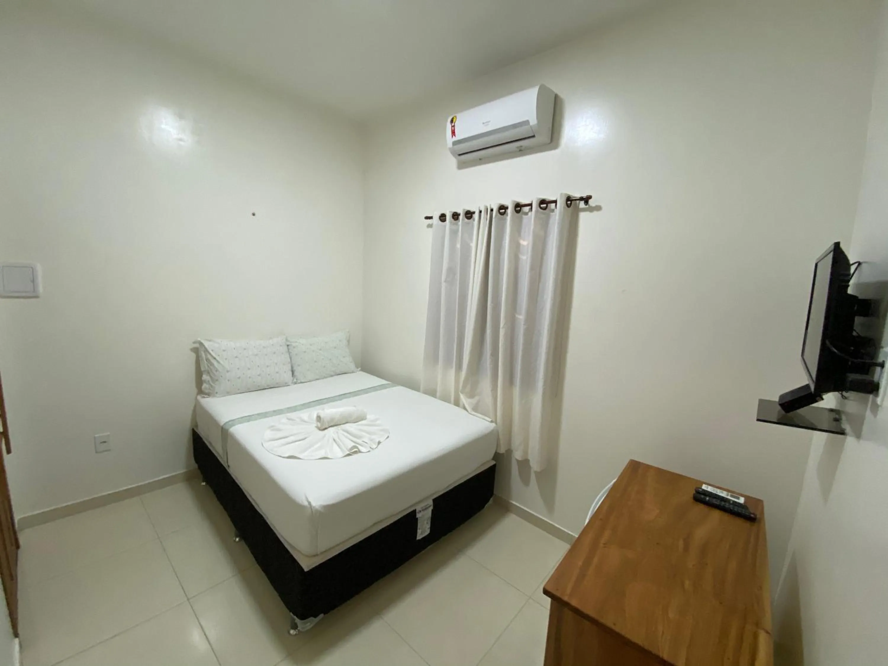 Bed in Pousada Casa da Cion