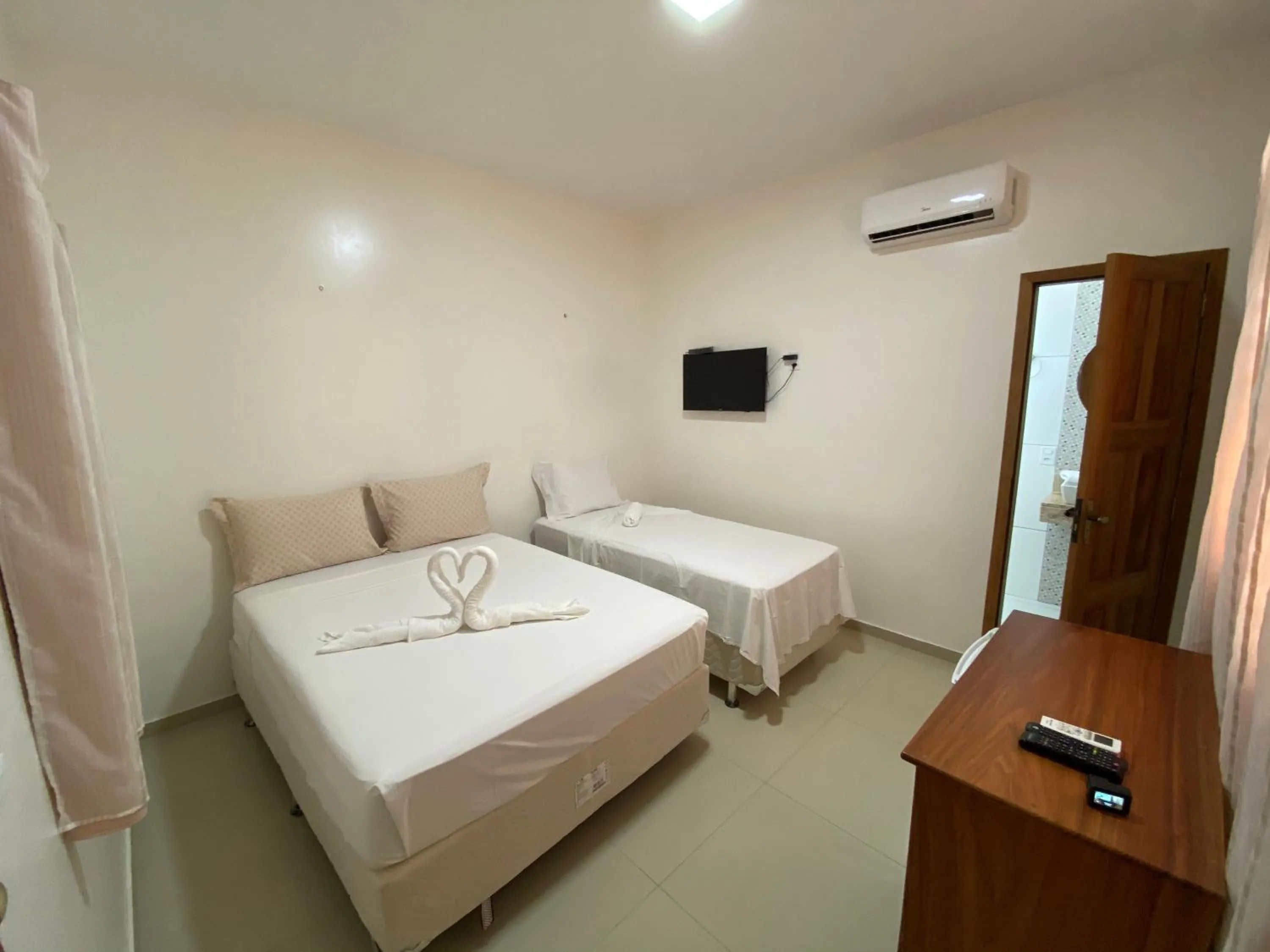 Bed in Pousada Casa da Cion