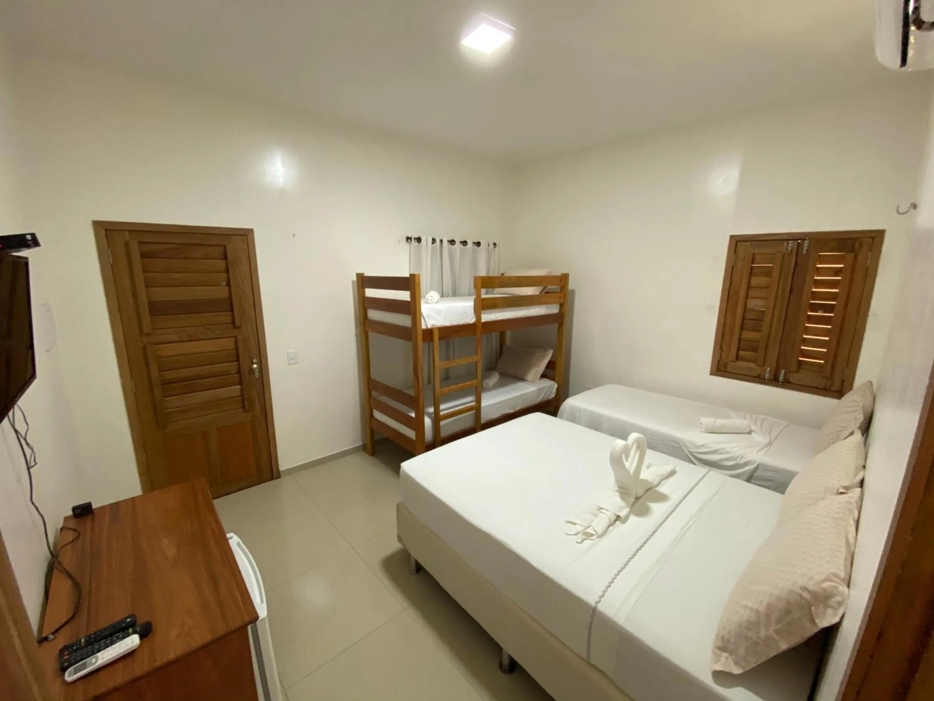 Bed in Pousada Casa da Cion