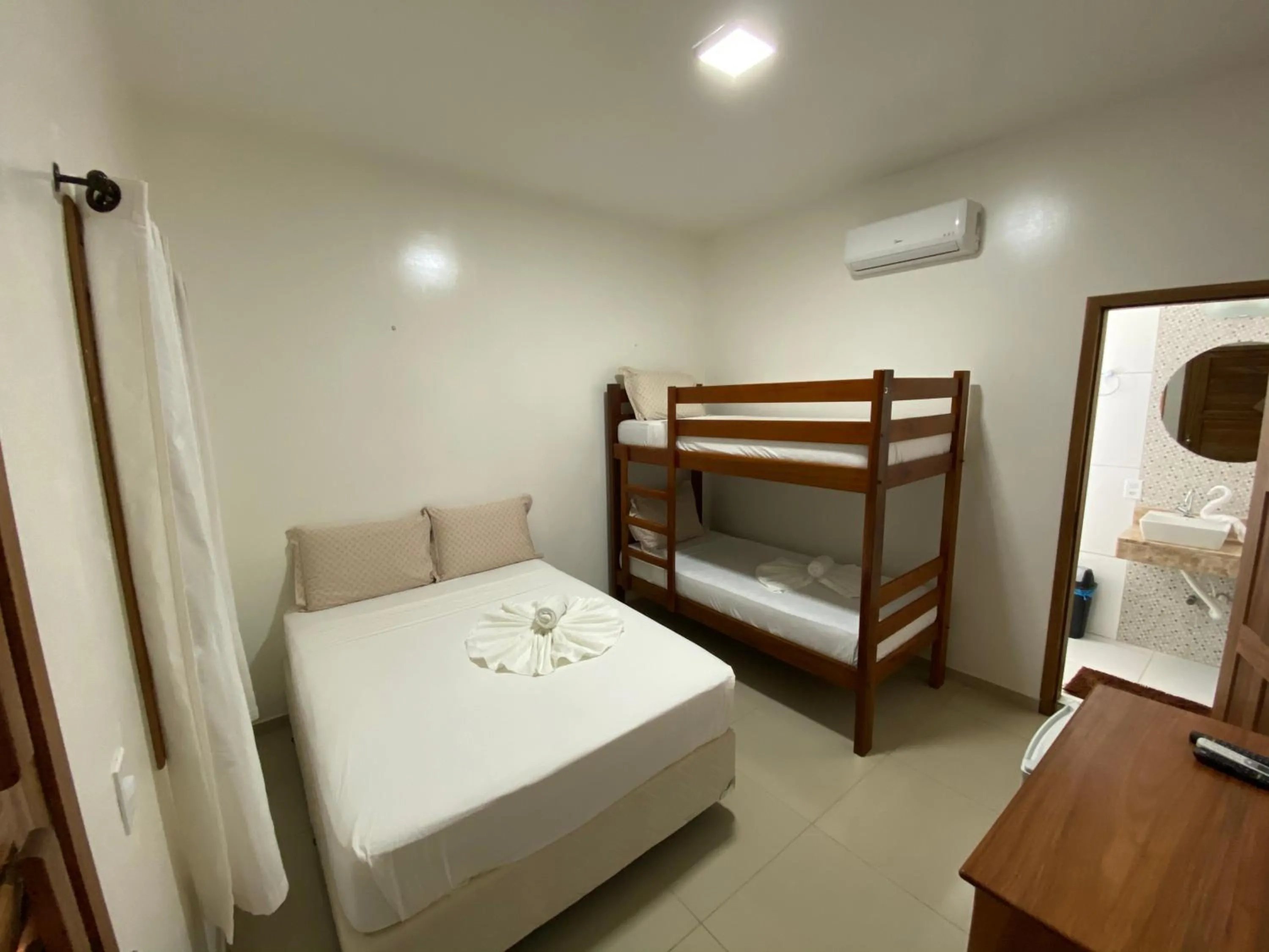 Bed in Pousada Casa da Cion