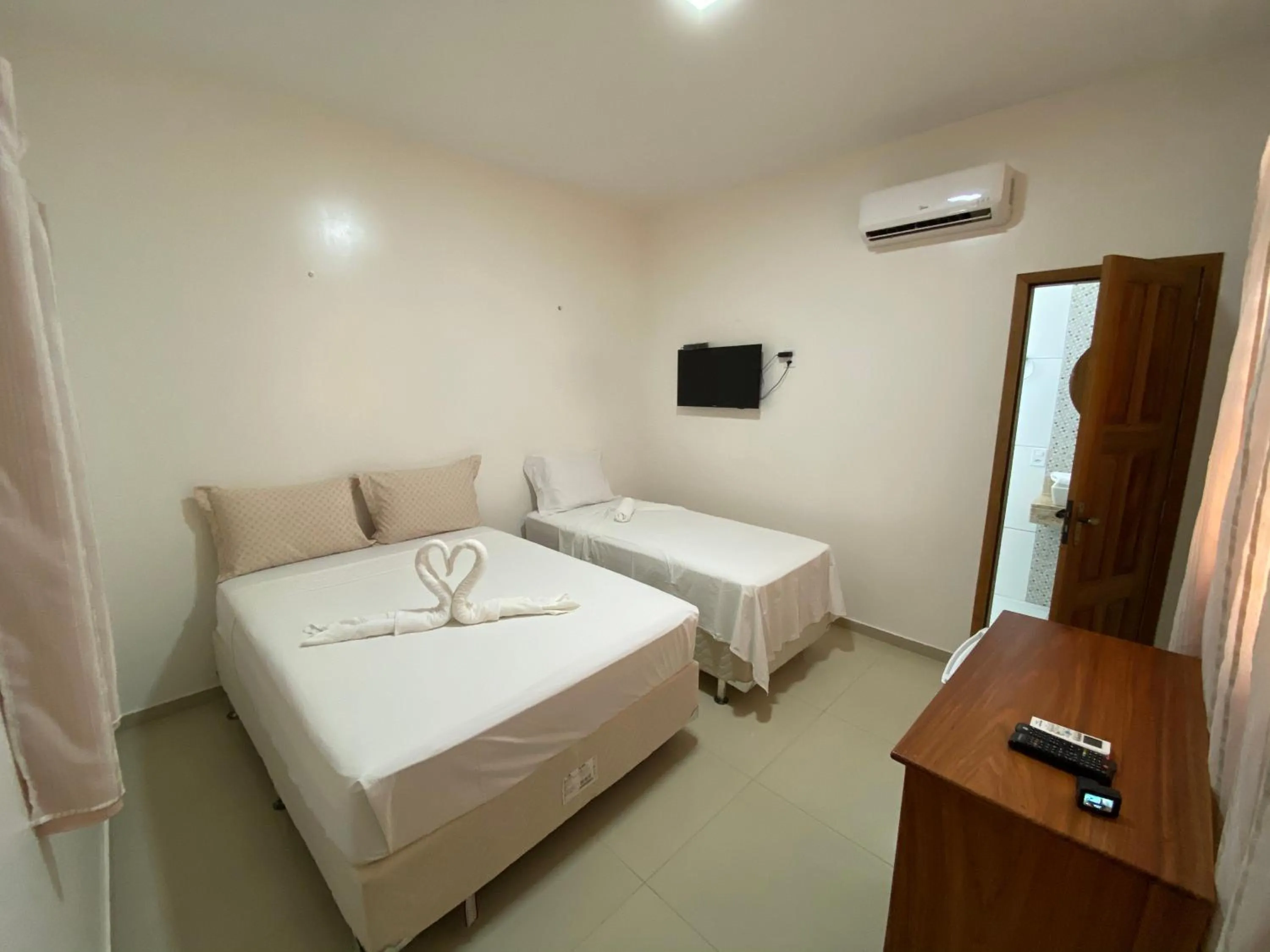 Bed in Pousada Casa da Cion