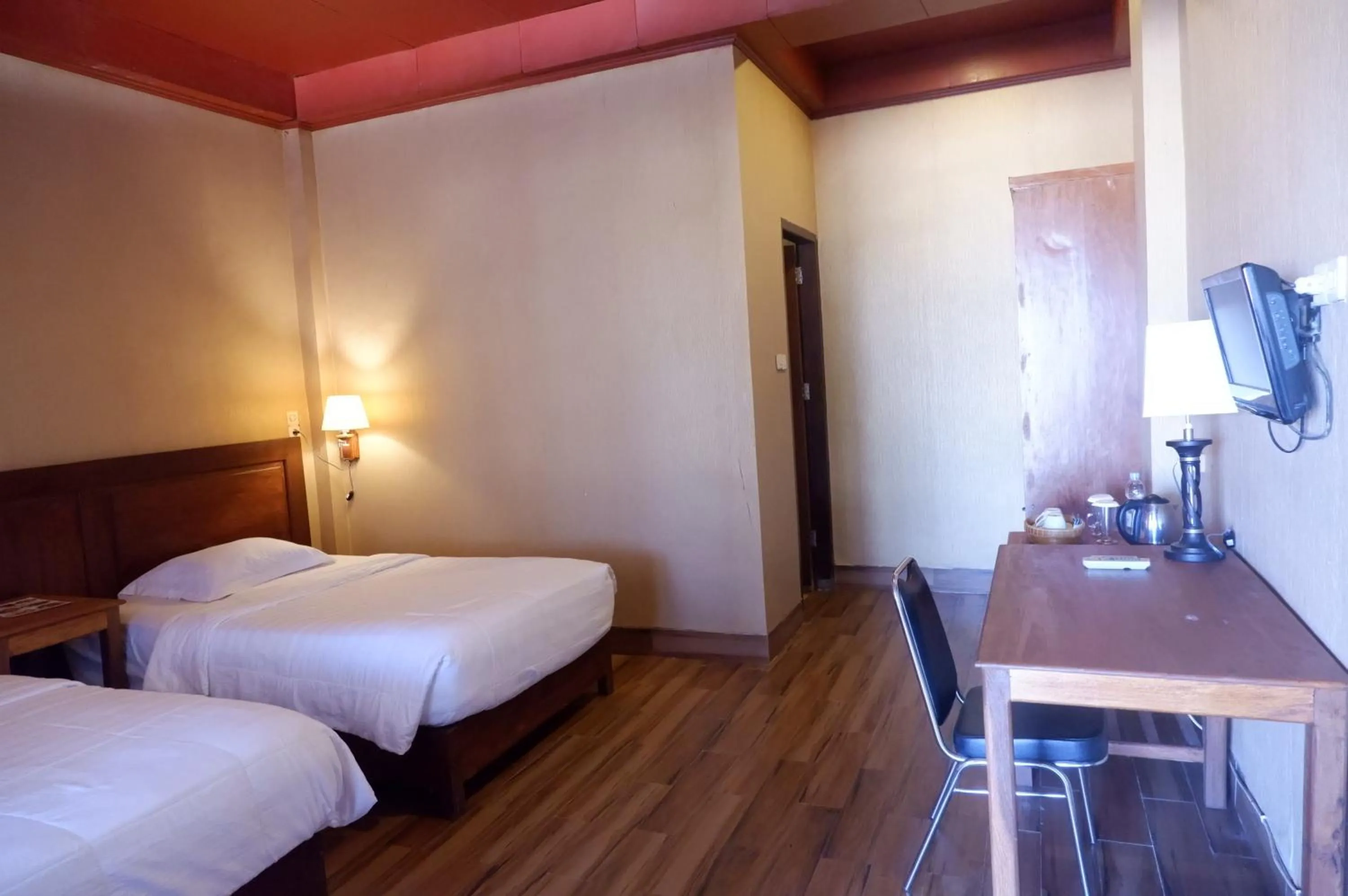 Bed in Wakatobi Patuno Diving and Beach Resort by SAHID