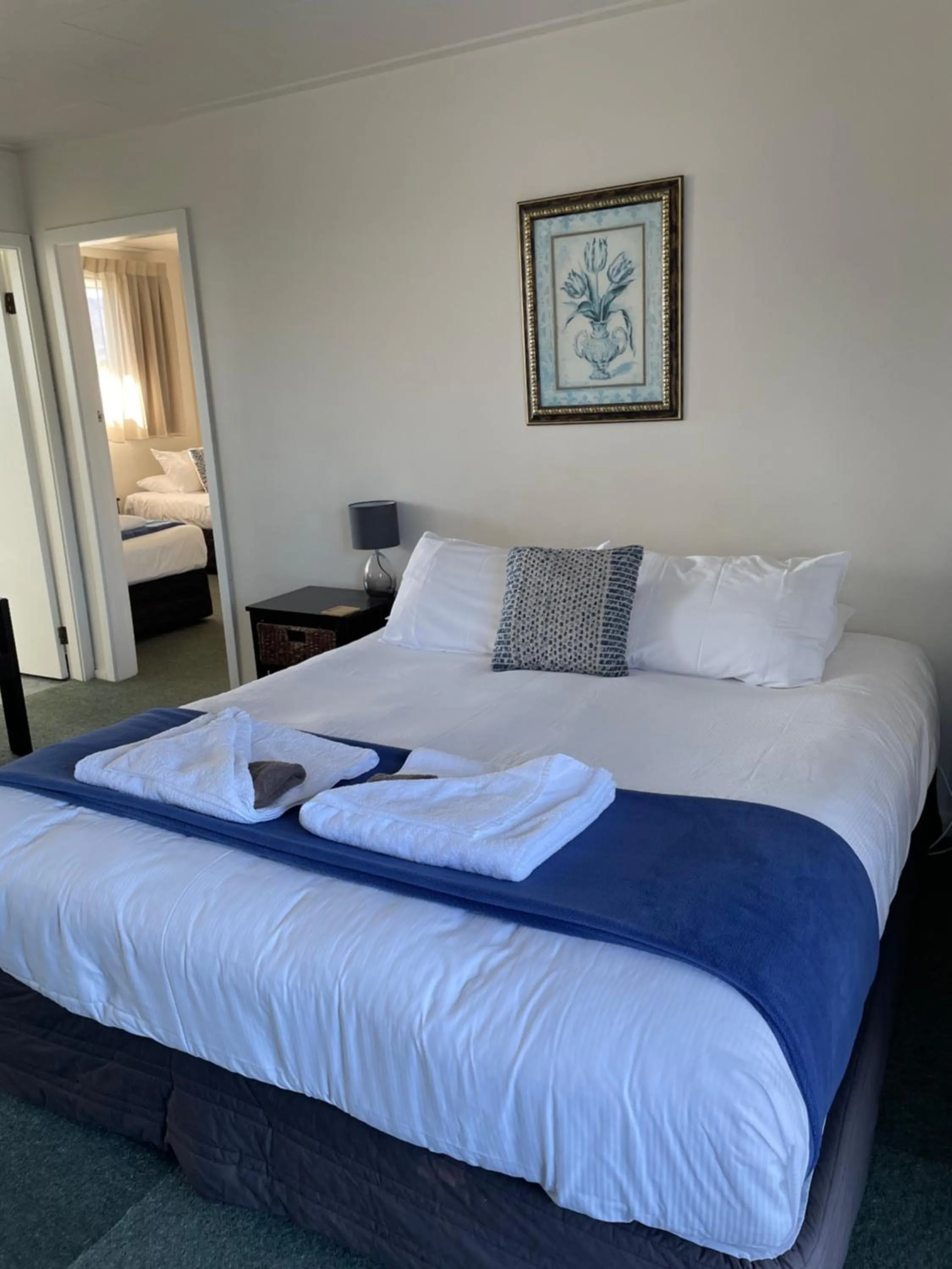 Bed in Buller Bridge Motel