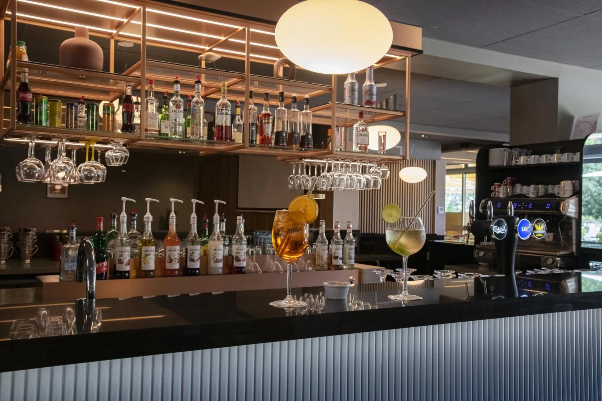 Lounge or bar in Novotel Antibes Sophia Antipolis