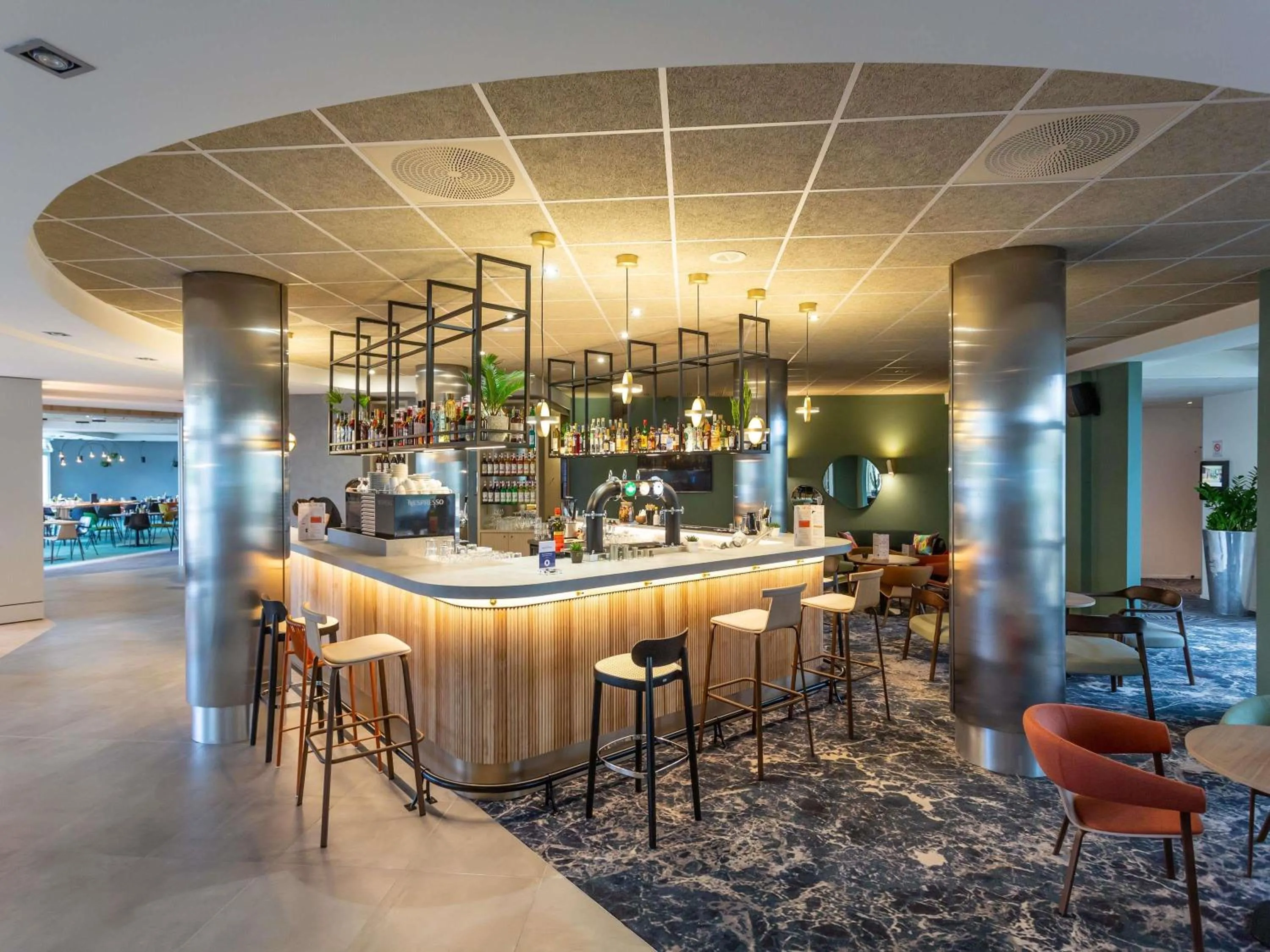 Lounge or bar in Novotel Bourges