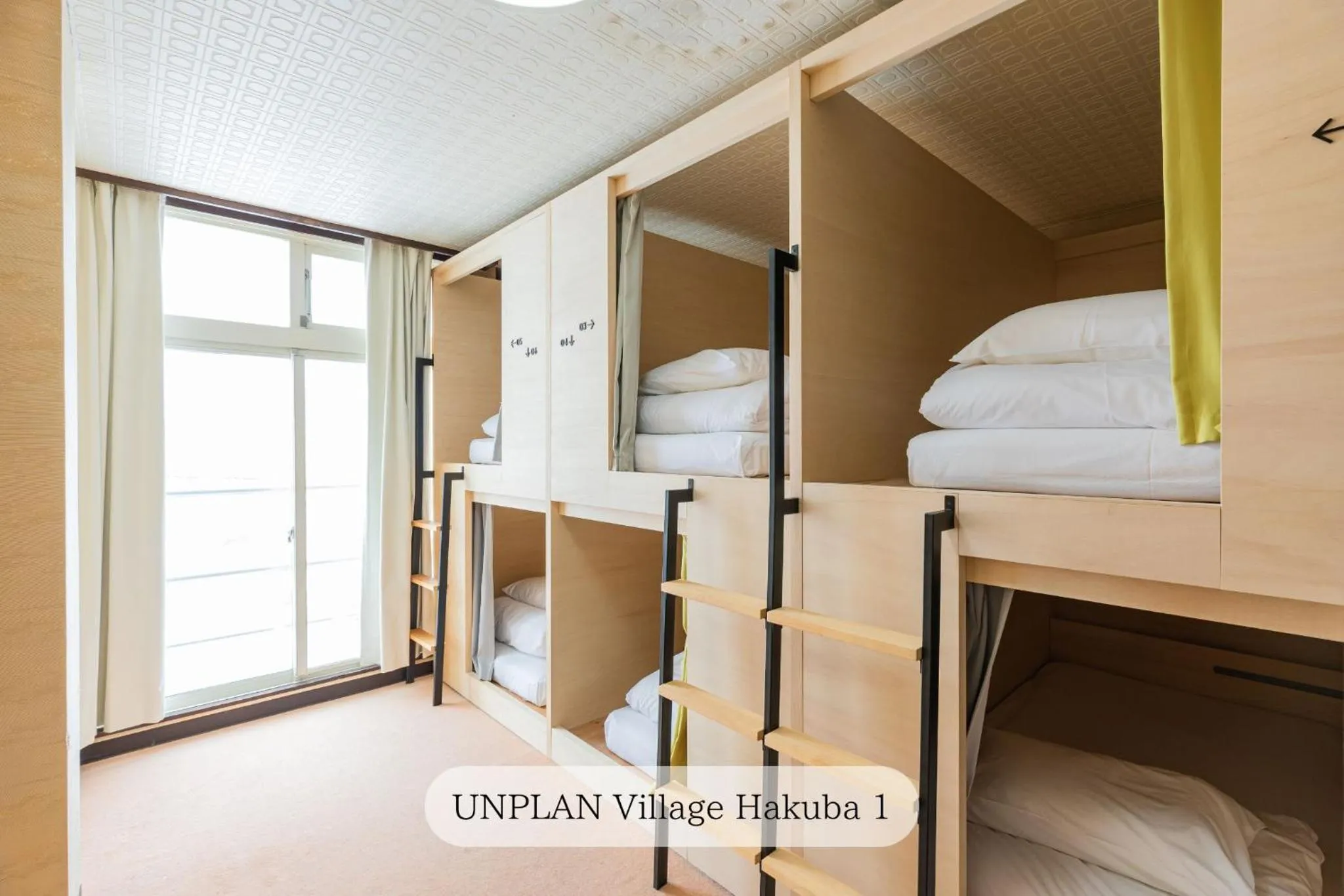 Bed in UNPLAN Village Hakuba