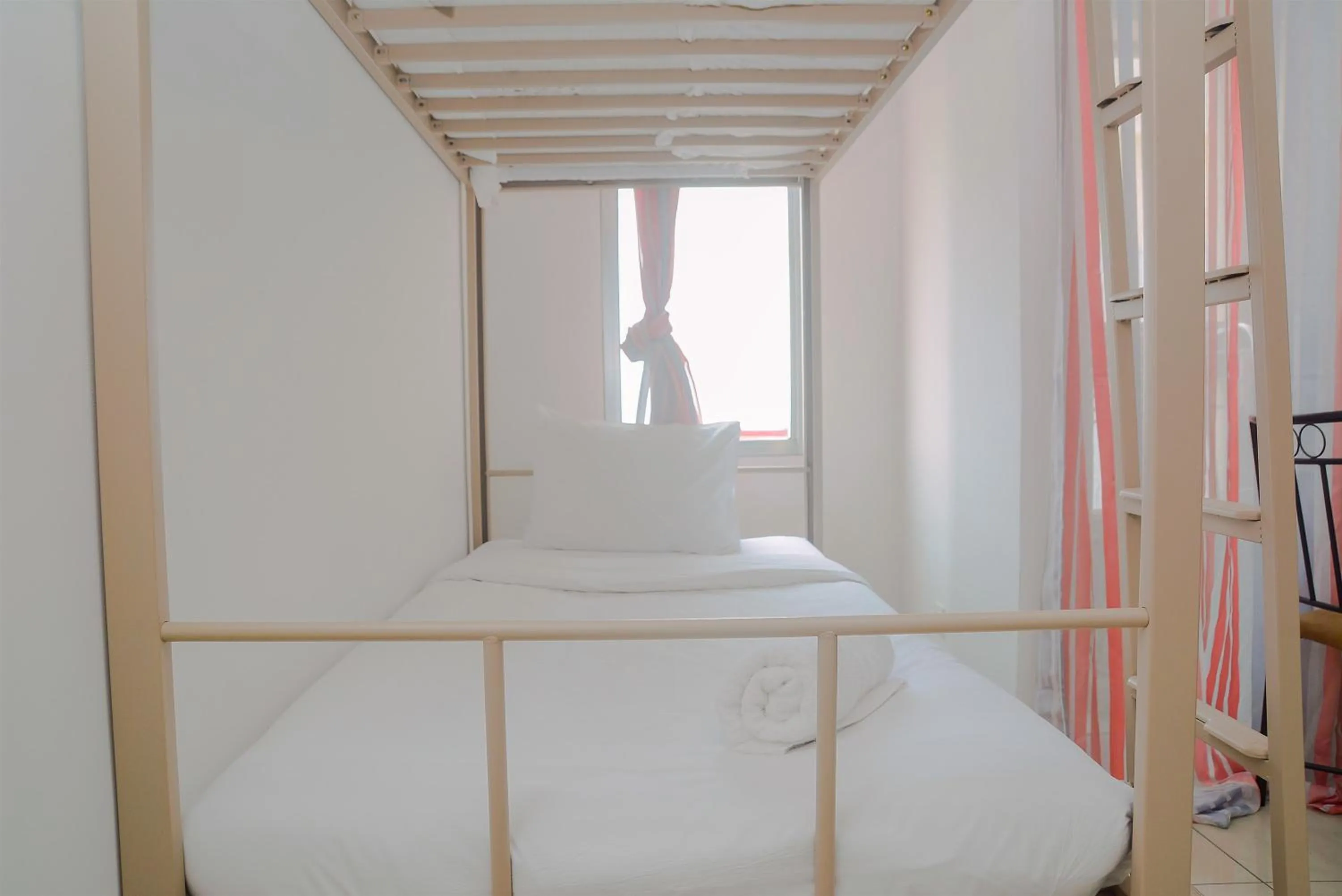 Bed in Green Bay Pluit Studio Apartment with 2 Single Beds By Travelio