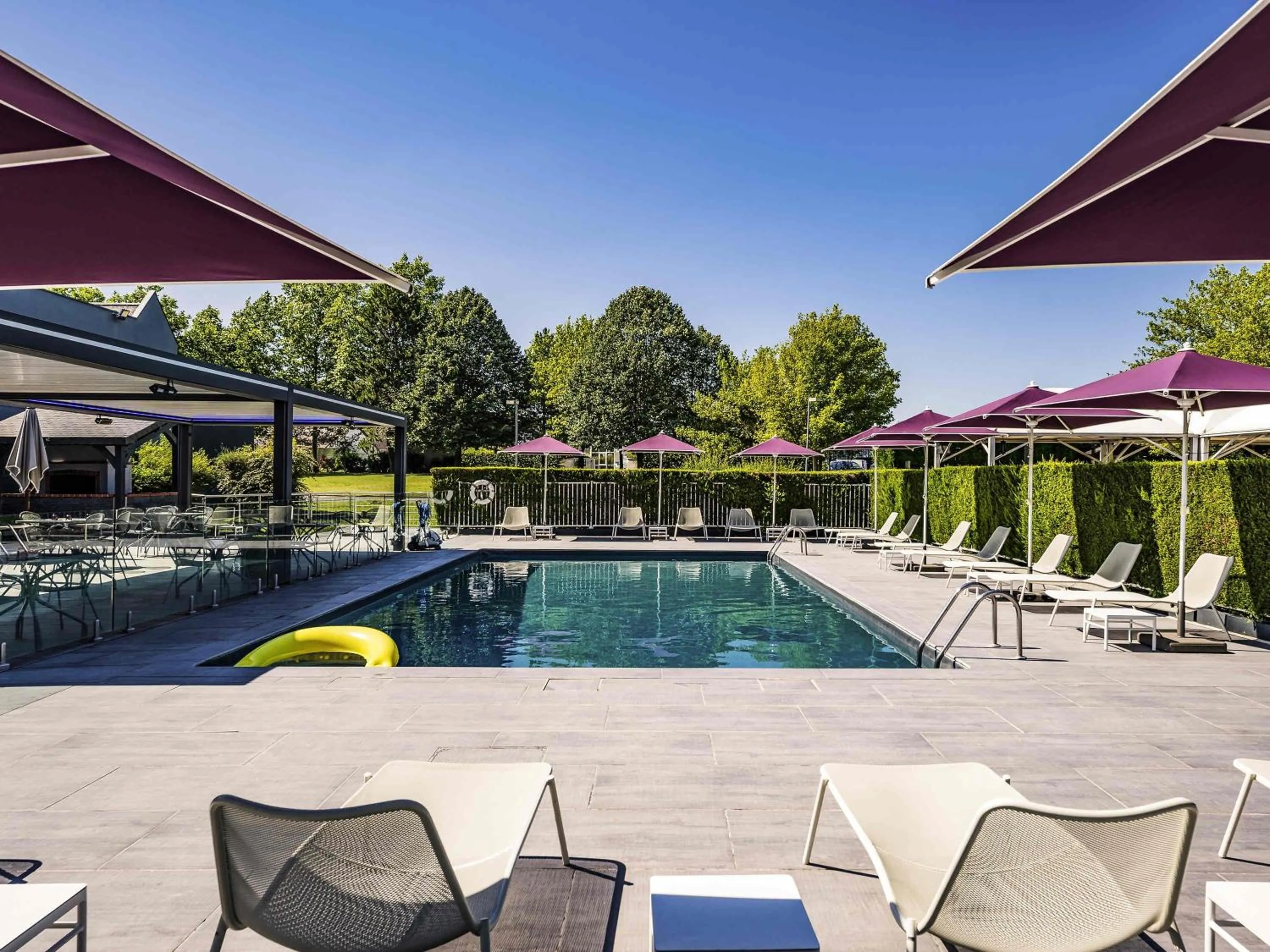 Pool view in Novotel Orléans Saint Jean de Braye