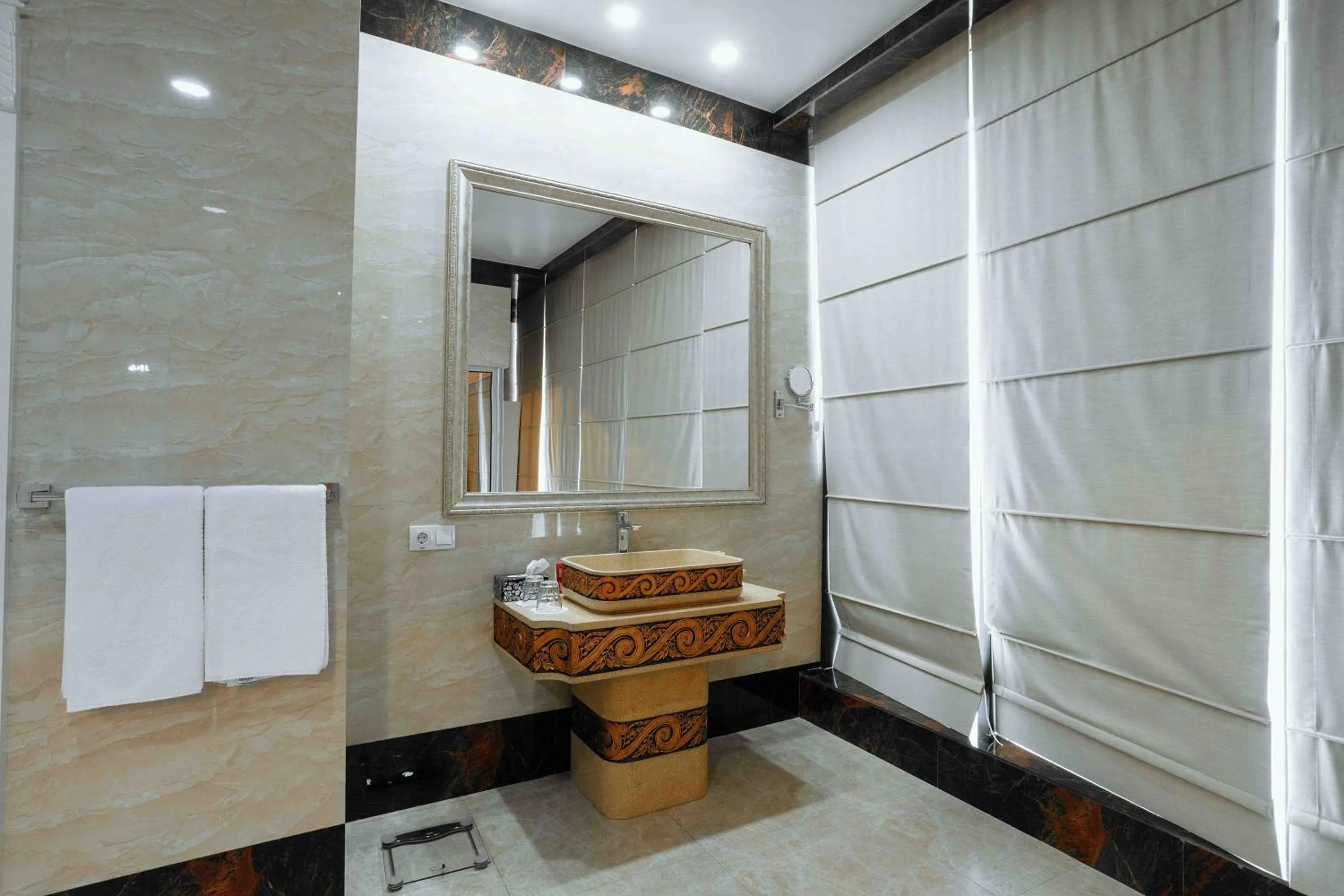 Bathroom in Ramada by Wyndham Shymkent